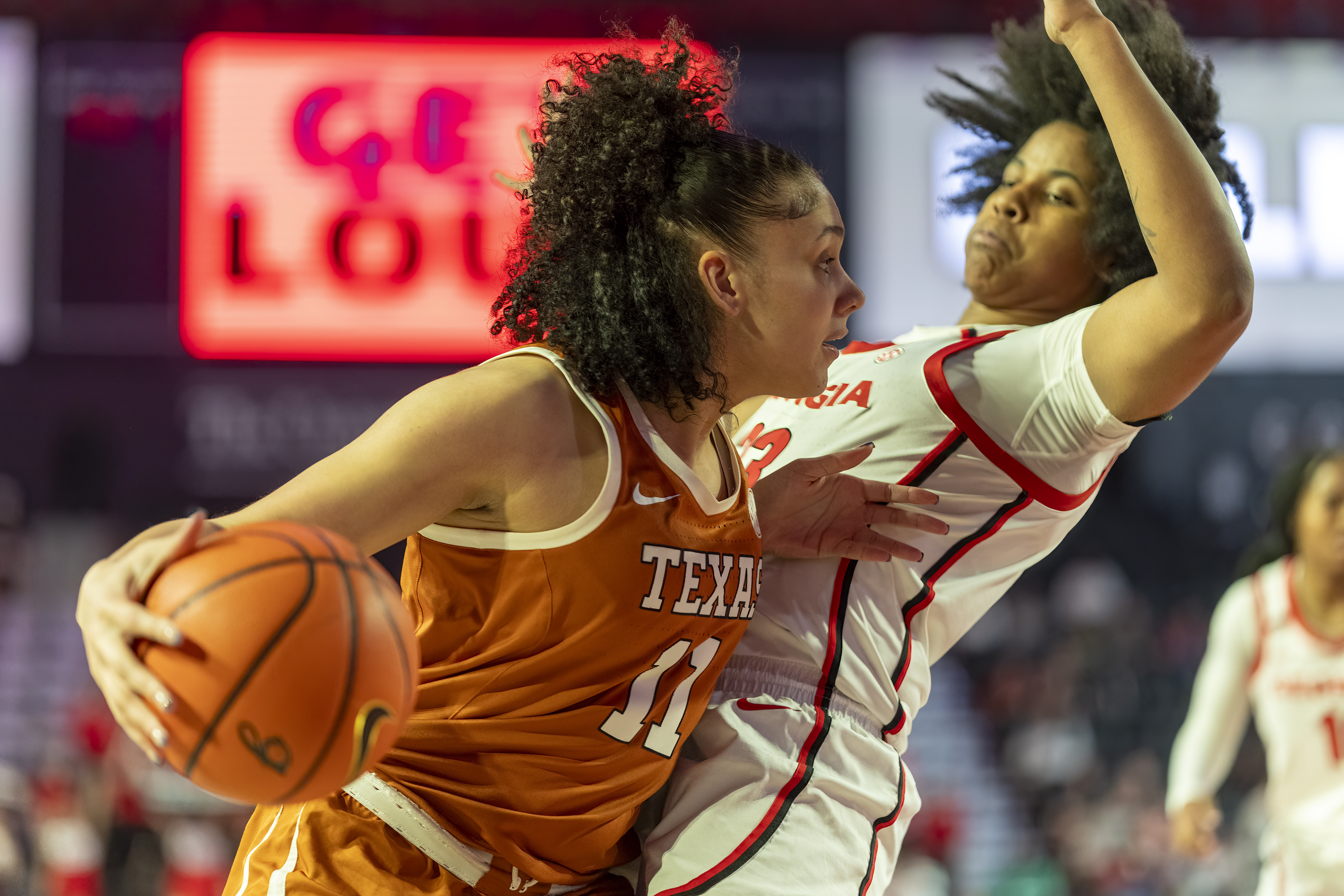 Texas forward Justice Carlton (11) fights for position during the first half of an NCAA college basketball game against Georgia, Monday, Feb. 24, 2025, in Athens, Ga. 