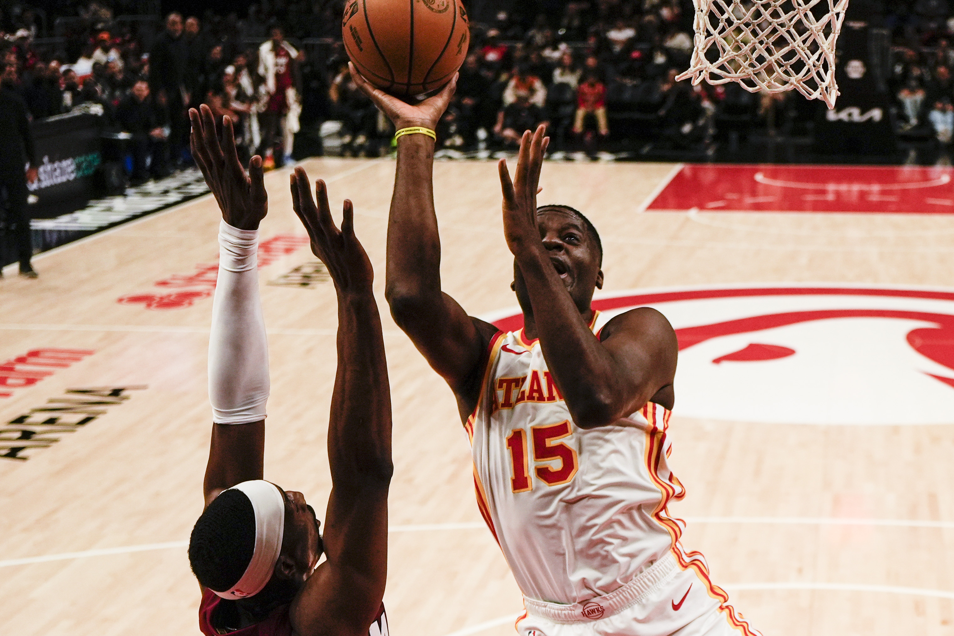 Atlanta Hawks center Clint Capela (15) shoots against Miami Heat center Bam Adebayo (13) during the first half of an NBA basketball game, Monday, Feb. 24, 2025, in Atlanta. 