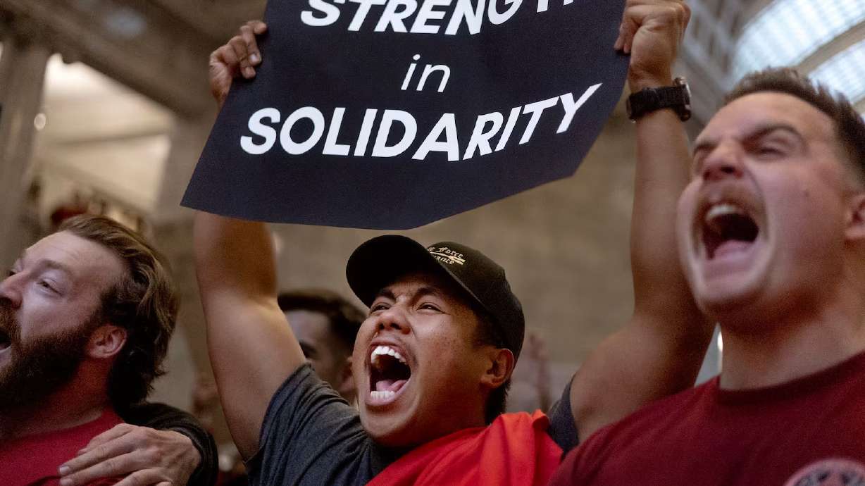Professional Firefighters of Utah members Donavan Minutes, left, Branden Cresencia and Bennett Lloyd chant during a rally in opposition to HB267, Public Sector Labor Union Amendments, at the Capitol in Salt Lake City on Feb. 7. A new bill has been numbered that would clarify definitions around labor organizations and public employees.