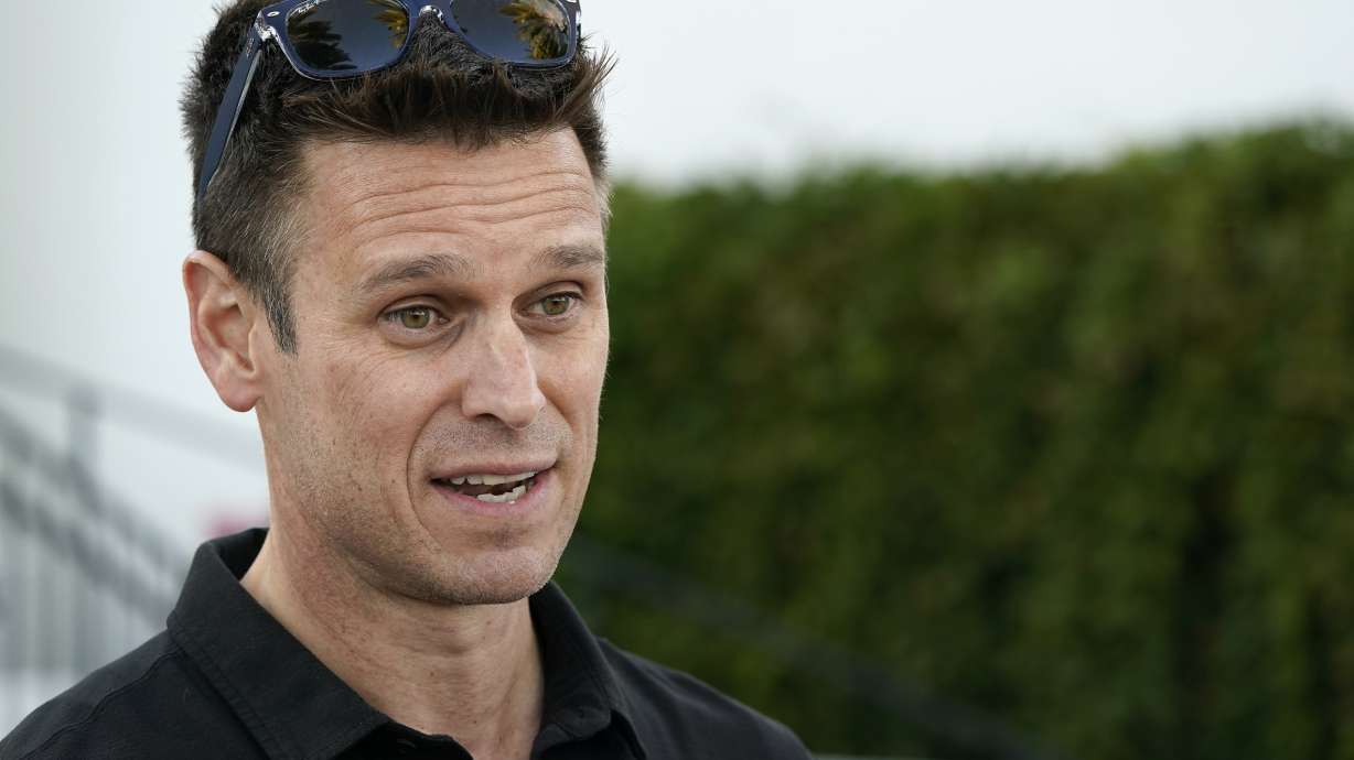 FILE -Seattle Mariners general manager Jerry Dipoto talks with reporters during Major League Baseball's GM Meetings, Nov. 9, 2021, in Carlsbad, Calif.