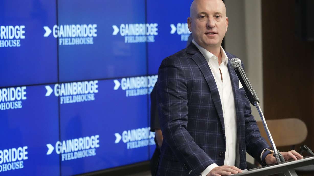 FILE - Group 1001 President & Chief Executive Officer Dan Towriss speaks during a news conference announcing that the Indiana Pacers basketball arena will be renamed Gainbridge Fieldhouse during the NBA basketball team's media day in Indianapolis, Monday, Sept. 27, 2021.