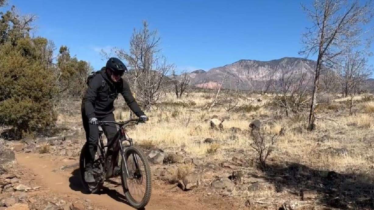 A biker cruises the Cliffrose Trail, which sits at 5,000 feet at the base of Pine Valley Mountain and offers sweeping views and areas for all levels of bikers, hikers and runners, Diamond Valley, Utah, date not specified.
