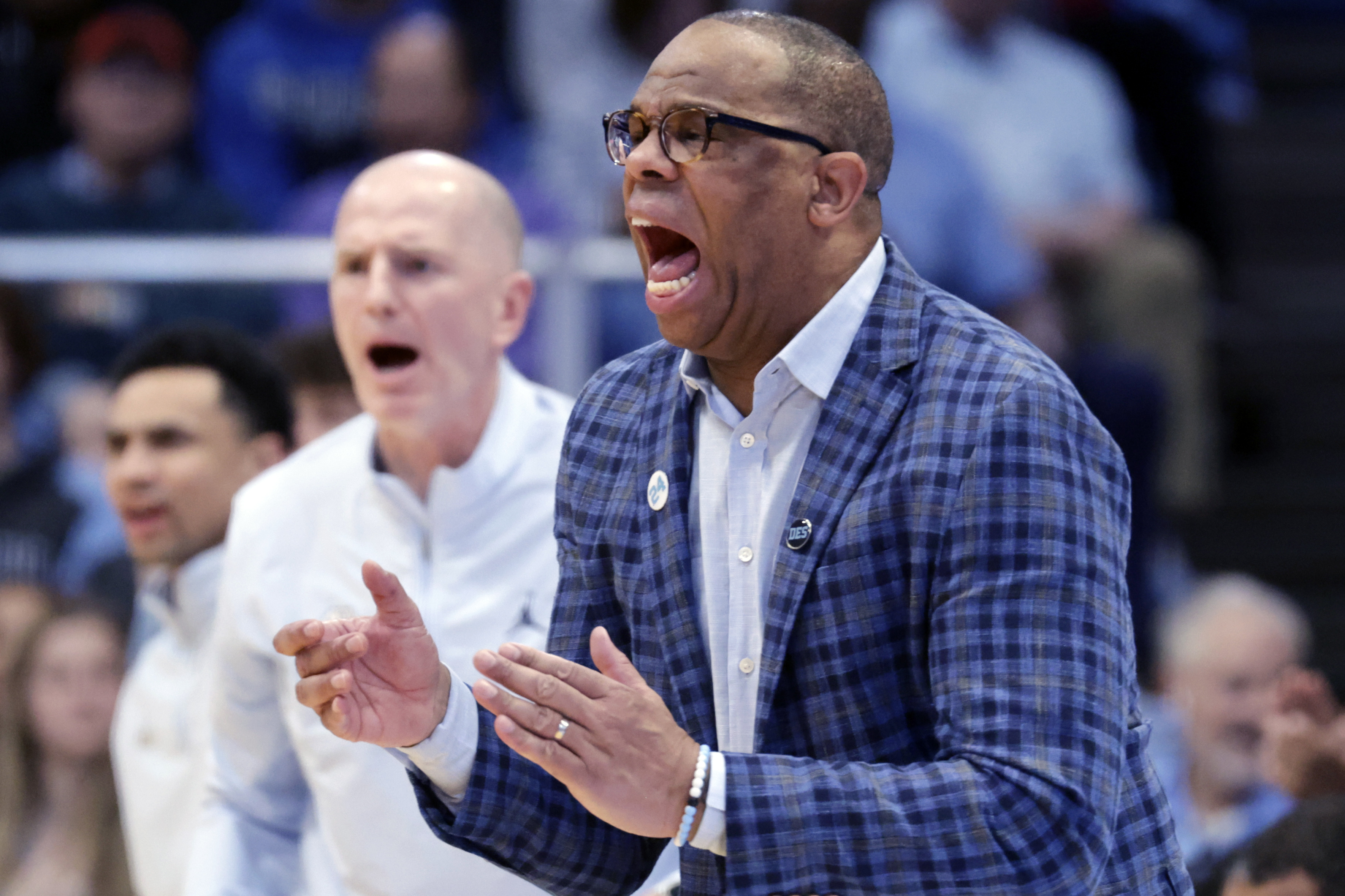 North Carolina head coach Hubert Davis directs the team against Virginia during the second half of an NCAA college basketball game Saturday, Feb. 22, 2025, in Chapel Hill, N.C.