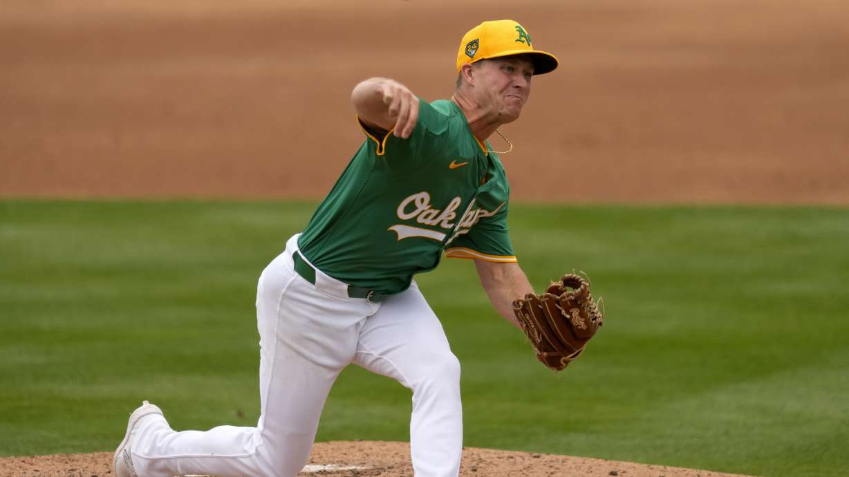 FILE - Oakland Athletics pitcher Trevor Gott throws against the Arizona Diamondbacks during the third inning of a spring training baseball game, Feb. 26, 2024, in Mesa, Ariz.
