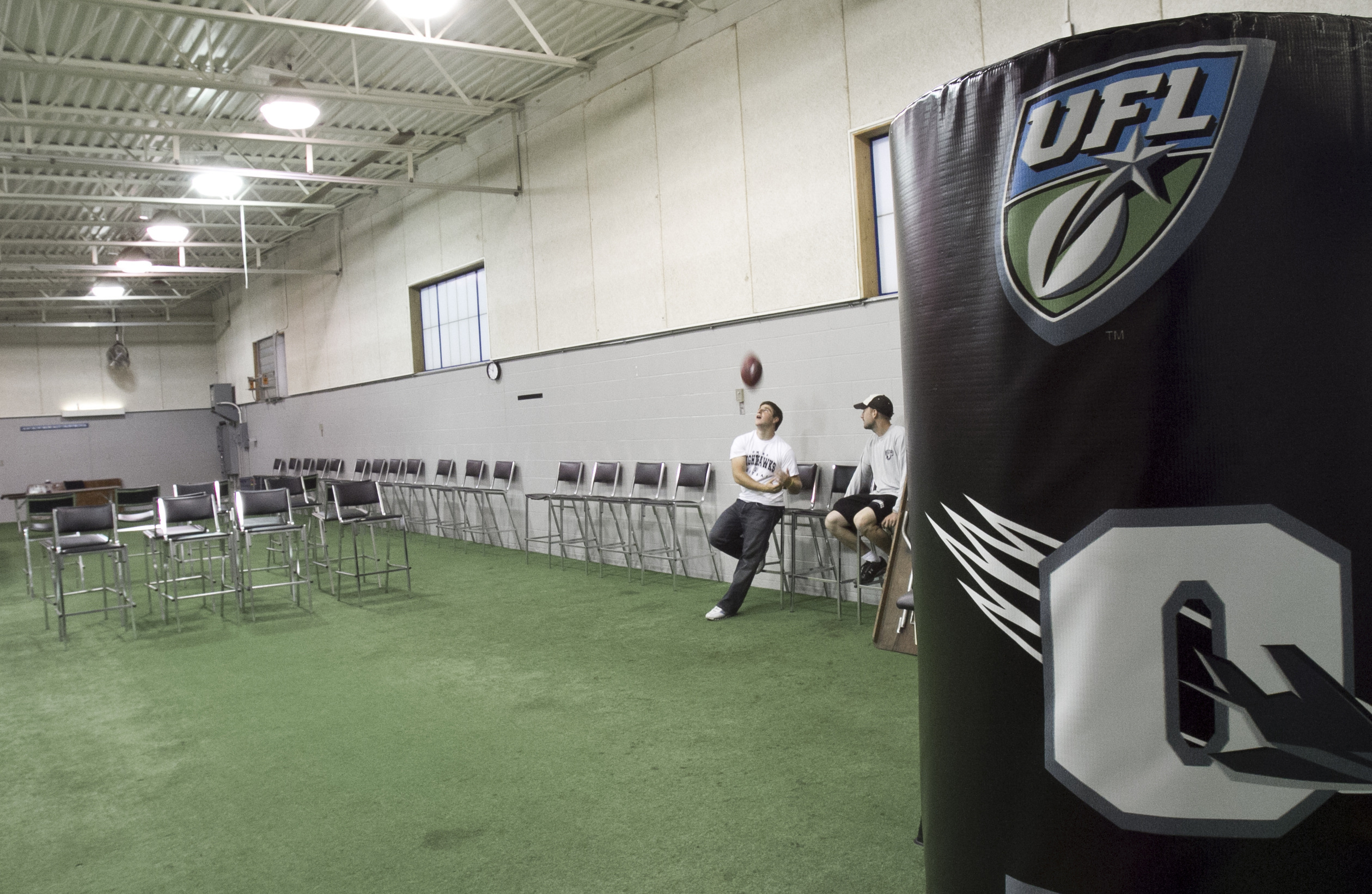 FILE - The former batting cage is converted into a player meeting room for the UFL Omaha Nighthawks, at Rosenblatt Stadium in Omaha, Neb., Friday, Oct. 1, 2010. 