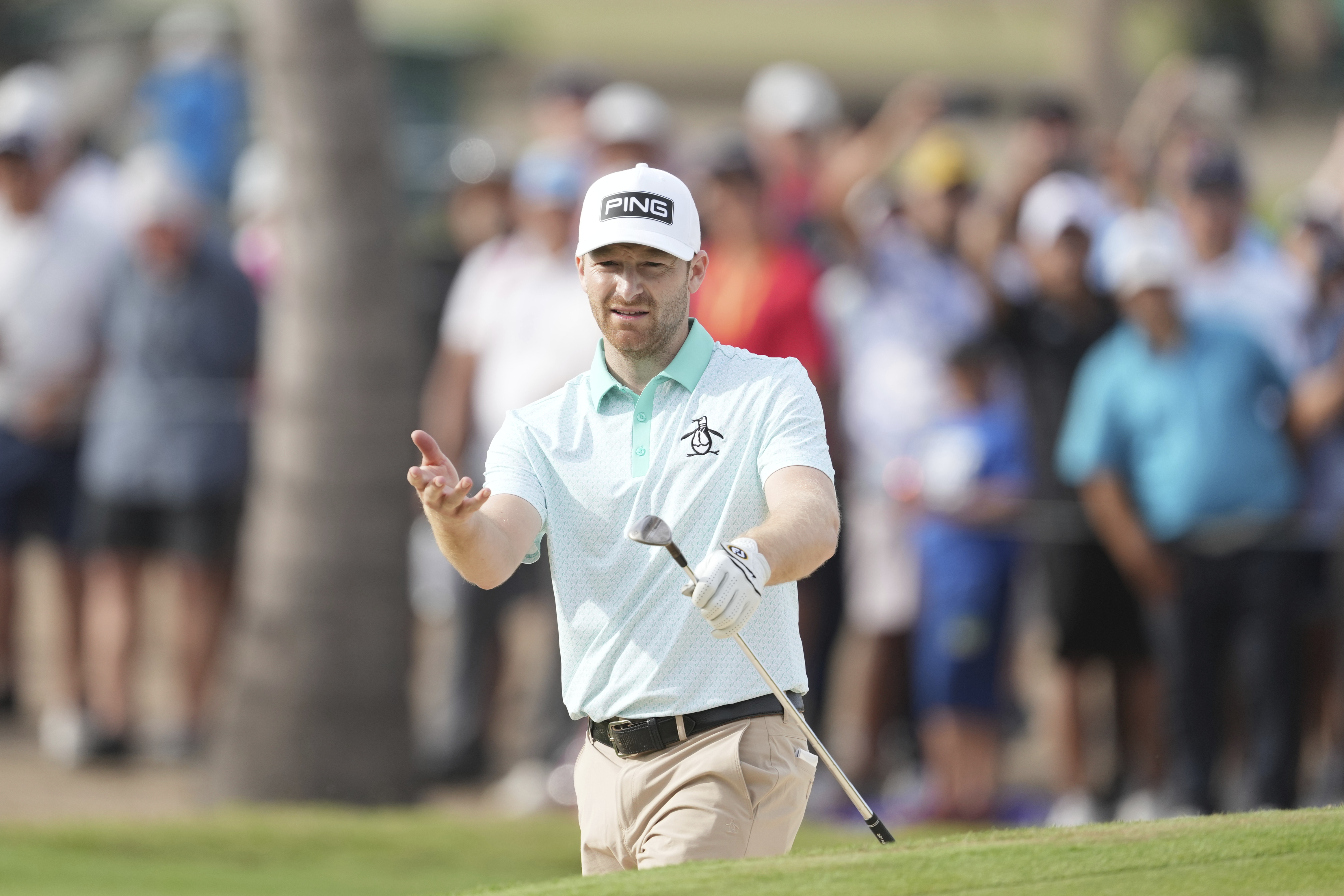 Brian Campbell, of the United States, reacts after his shot from a bunker on the 18th hole during the final round of the Mexico Open golf tournament in Puerto Vallarta, Mexico, Sunday, Feb. 23, 2025. 
