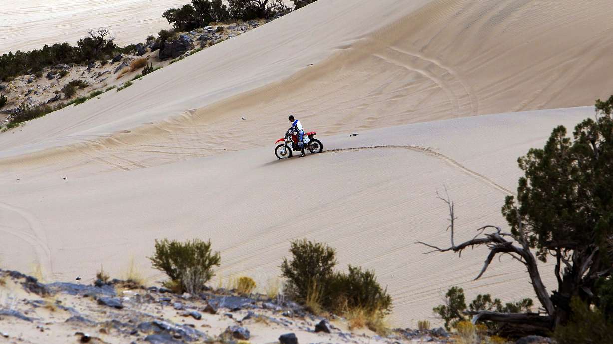 A person rides an off-road vehicle at Little Sahara Recreation Area on Sept. 14, 2011. A resolution could turn the area into a state parks through a federal agreement, while outlining a way for Utah to pay for deferred maintenance at national parks.