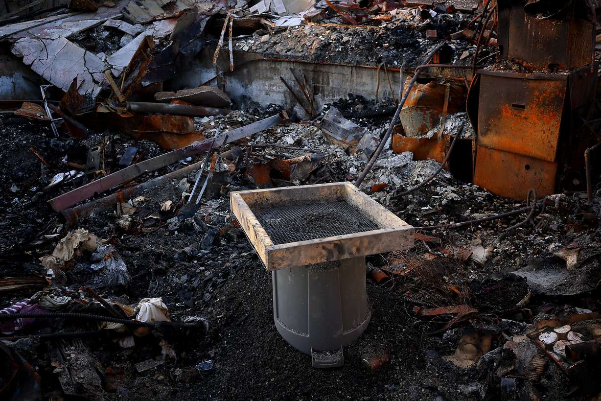 A sifter used by Mike and Susan Christensen sits in the ruins of their Altadena, Calif., home that was one of many destroyed by the recent wildfires that swept through Southern California. The couple have spent time searching for anything salvageable in their home.