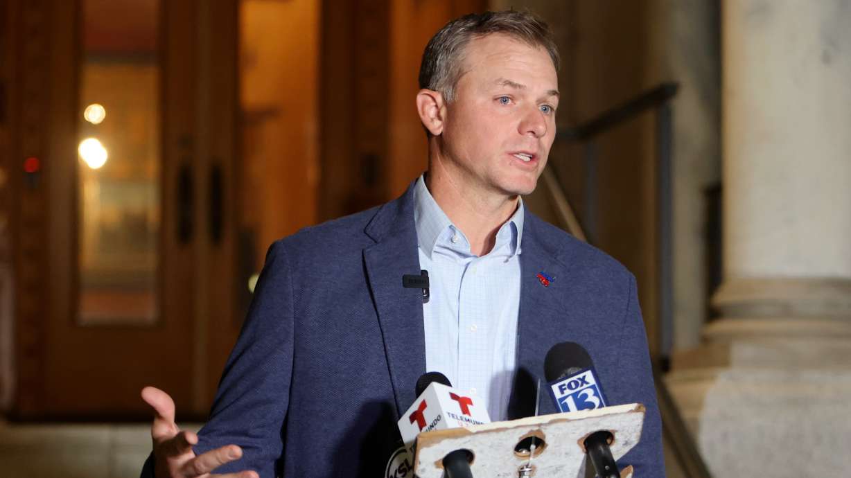 U.S. Rep. Blake Moore, R-Utah, talks to the media in Salt Lake City on Nov. 5, 2024. Moore on Thursday said White House warnings that back pay may not be guaranteed for furloughed government workers is not a narrative residents need right now.