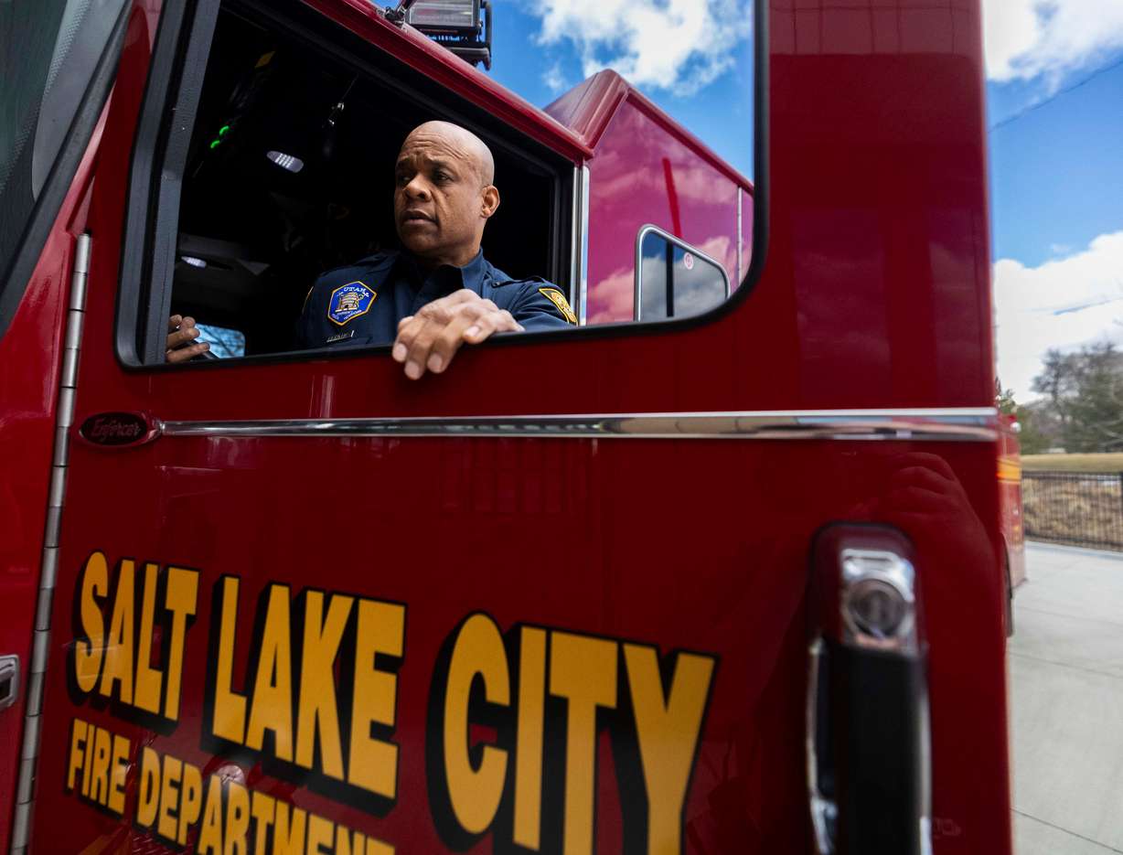 Salt Lake City firefighter Gary Perkins steps out of a fire engine while running through and checking their equipment at Salt Lake City Fire Station 3 in Salt Lake City on Tuesday.