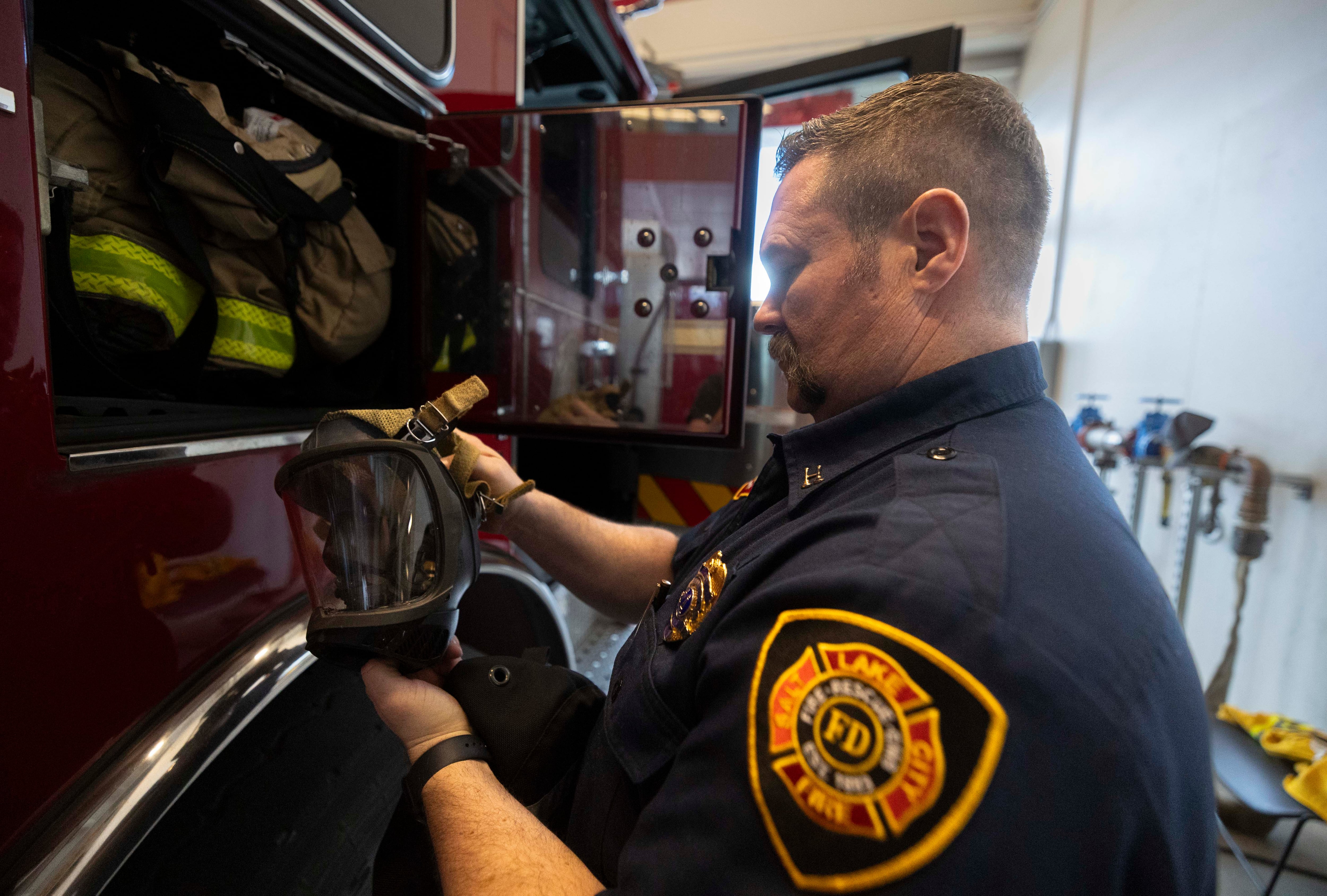 Salt Lake City Fire Capt. Jeff Kauffmann checks his equipment at Salt Lake City Fire Station 3 in Salt Lake City on Tuesday.