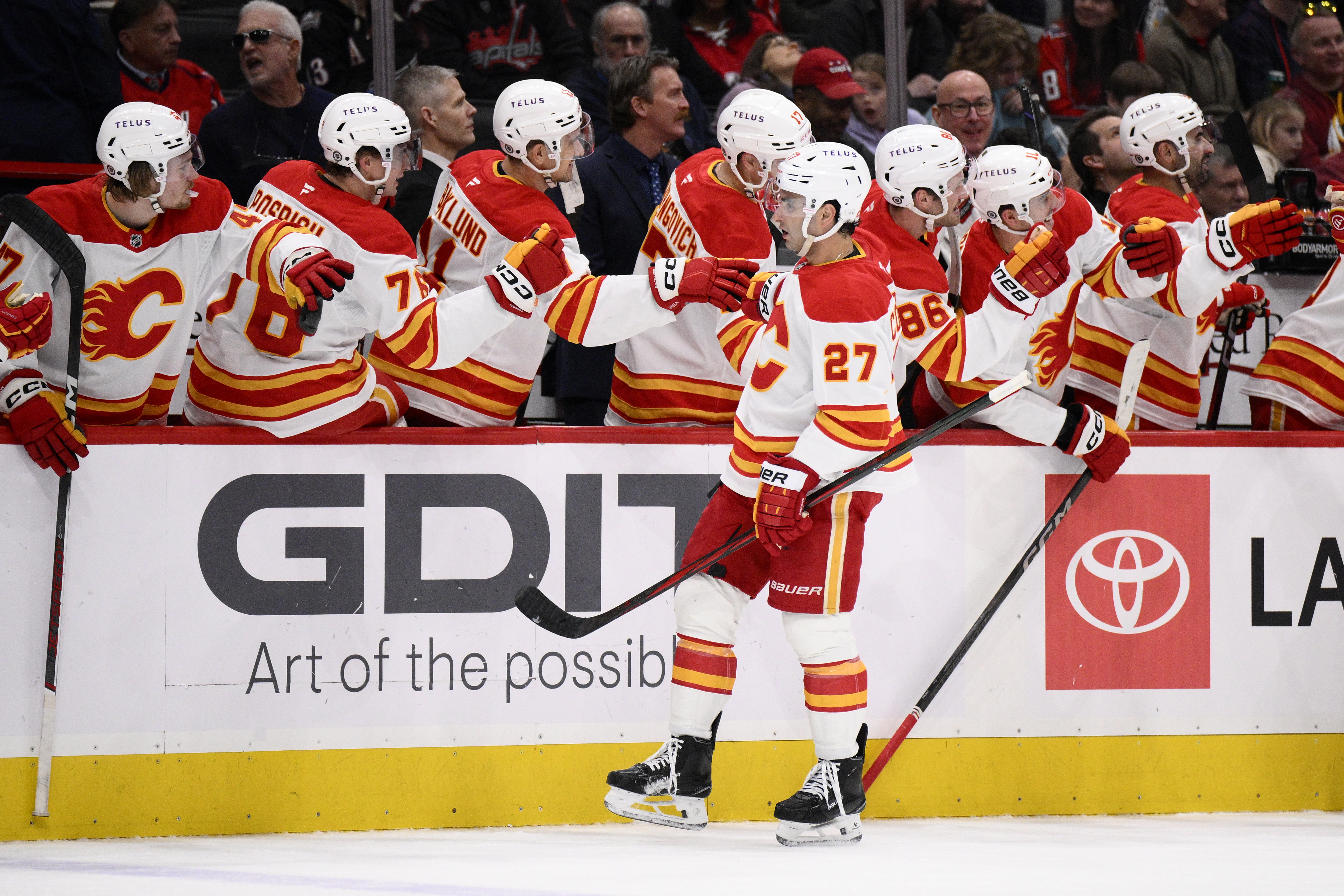 Calgary Flames right wing Matt Coronato (27) celebrates his goal during the first period of an NHL hockey game against the Washington Capitals, Tuesday, Feb. 25, 2025, in Washington.