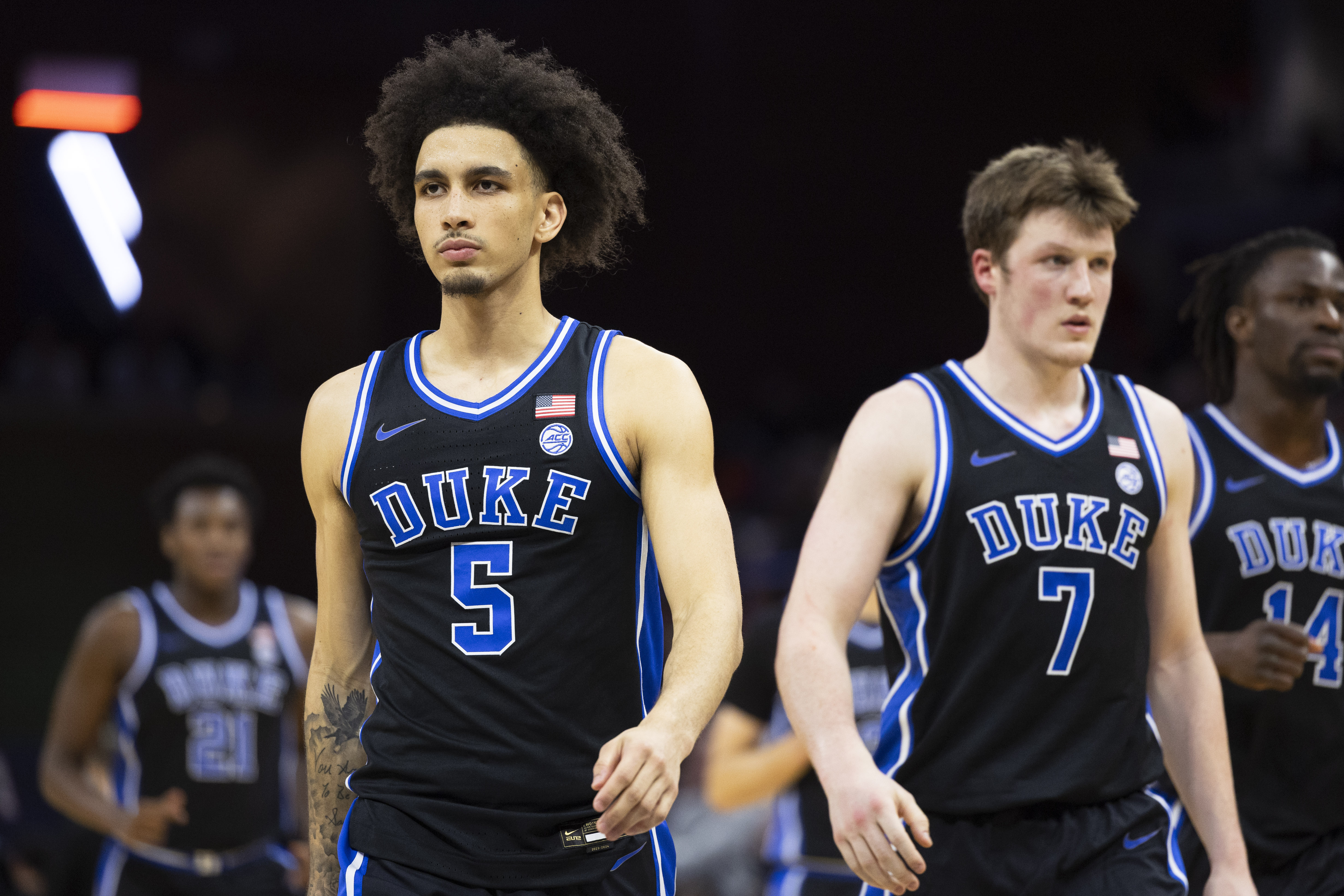 Duke guard Tyrese Proctor (5) and guard Kon Knueppel (7) walk out on the court with their teammates during the second half of an NCAA college basketball game against Virginia, Monday, Feb. 17, 2025, in Charlottesville, Va. 