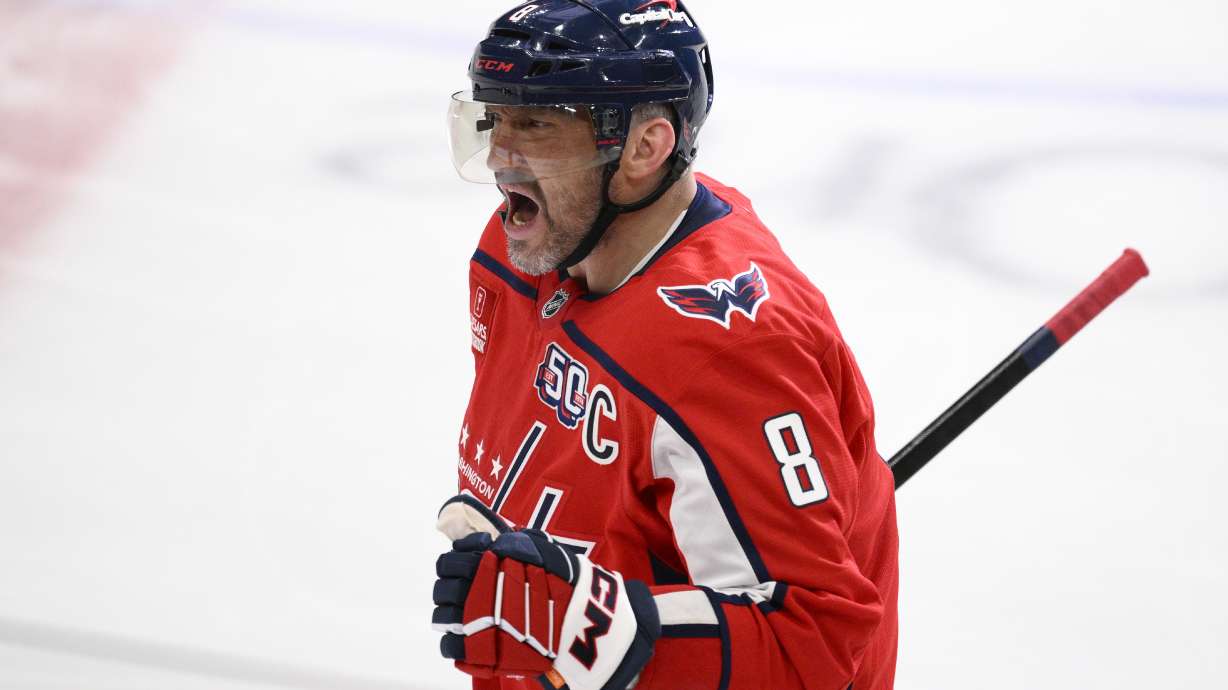Washington Capitals left wing Alex Ovechkin celebrates his goal during the third period of an NHL hockey game against the Calgary Flames as he skates towards the bench, Tuesday, Feb. 25, 2025, in Washington.
