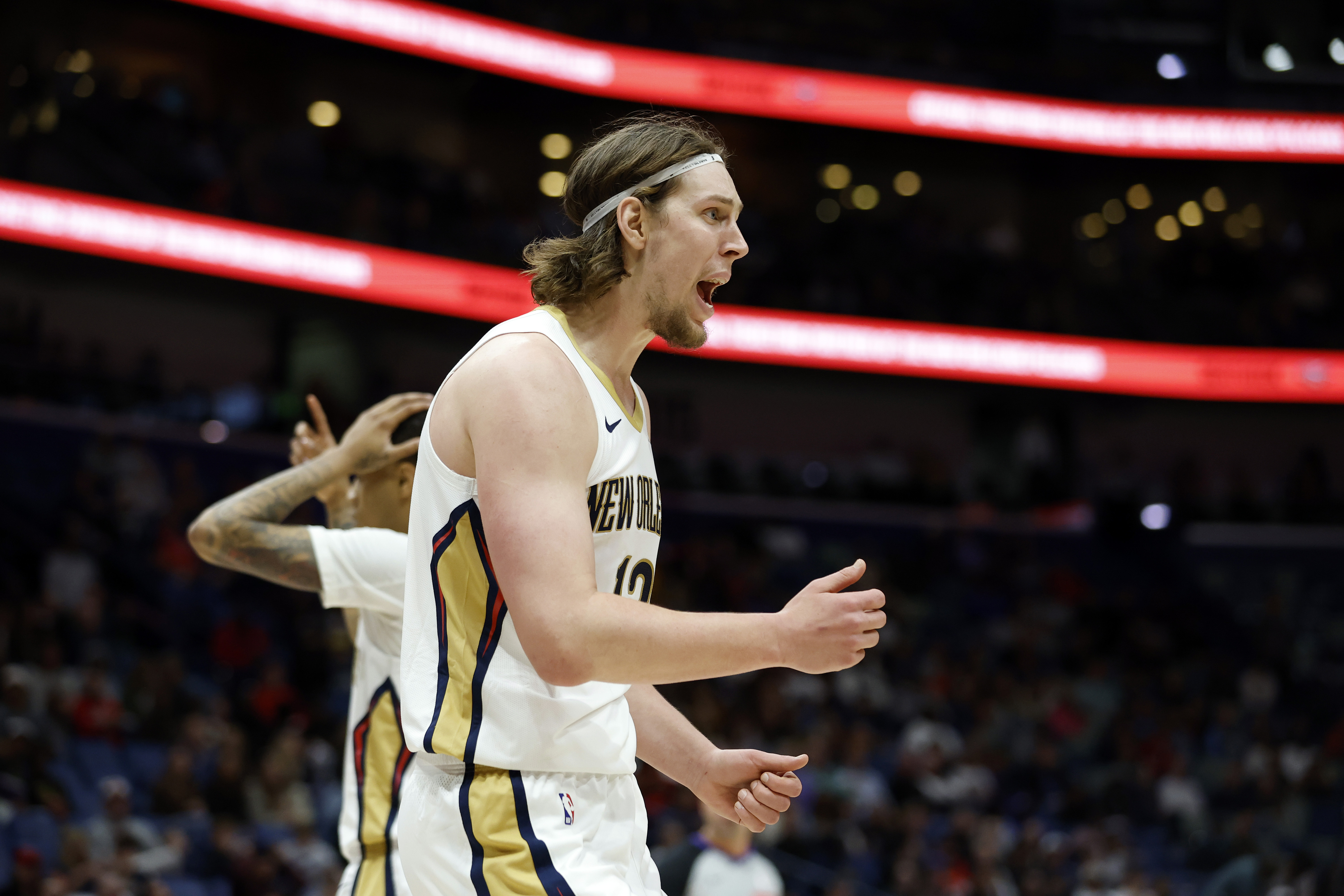 New Orleans Pelicans forward Kelly Olynyk (13) reacts to a call in the first half of an NBA basketball game against the San Antonio Spurs in New Orleans, Tuesday, Feb. 25, 2025. 