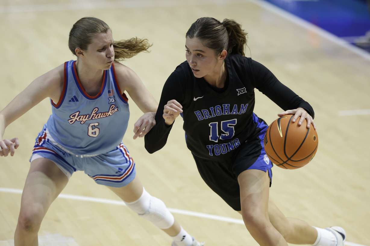 BYU guard Kemery Congdon drives to the rim during a Big 12 women's basketball game against Kansas, Tuesday, Feb. 25, 2025, in Provo, Utah.