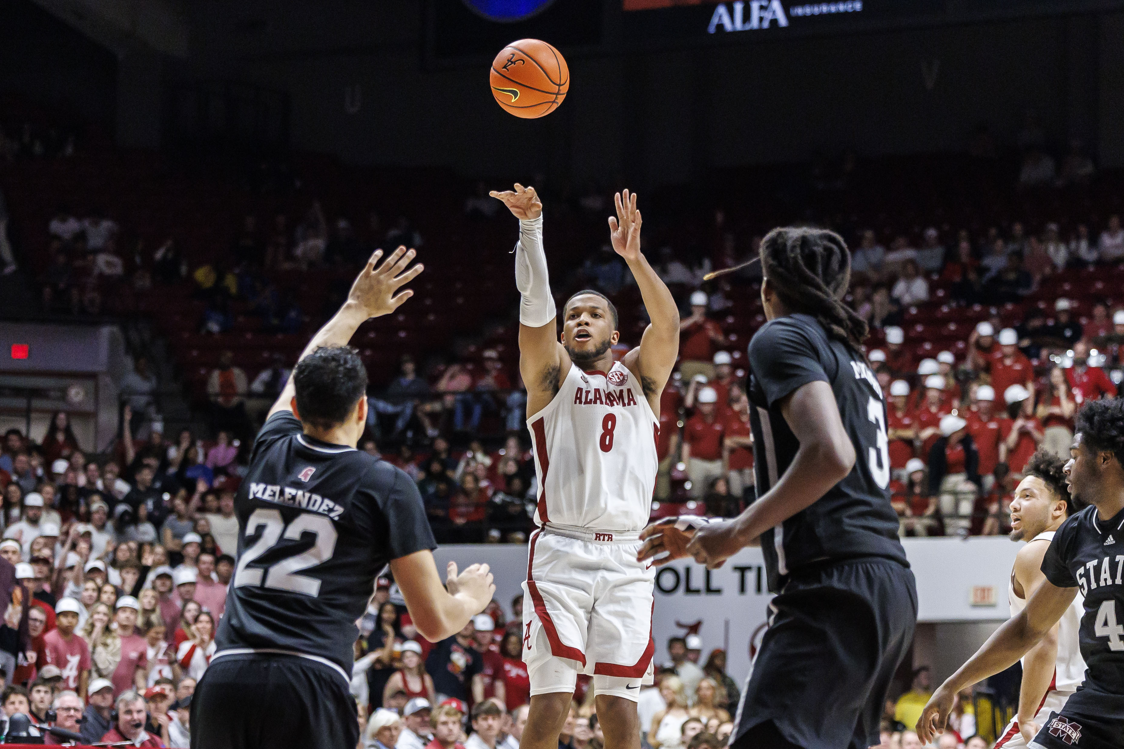 Alabama guard Chris Youngblood (8) shoots a 3-point shot against Mississippi State during the second half of an NCAA college basketball game, Tuesday, Feb. 25, 2025, in Tuscaloosa, Ala. 