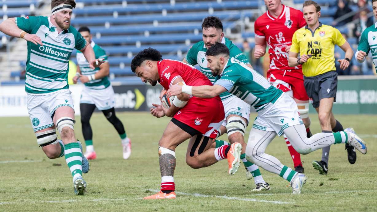 Utah Warriors wing Joe Mano is brought down before scoring one of two tries against the Chicago Hounds in a Major League Rugby match, Feb. 22, 2025 in Bridgeview, Illinois.
