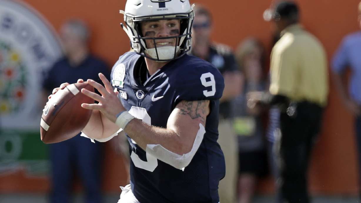 FILE - Penn State quarterback Trace McSorley looks for a receiver against Kentucky during the first half of the Citrus Bowl NCAA college football game, Jan. 1, 2019, in Orlando, Fla.