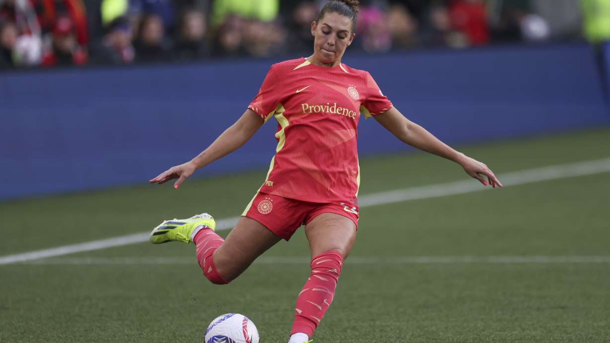 FILE - Portland Thorns FC forward Morgan Weaver (22) controls the ball during an NWSL soccer match against NJ/NY Gotham FC, March 24, 2024, in Portland, Ore.