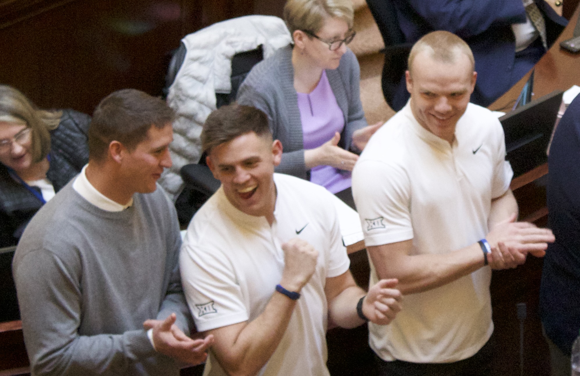 BYU quarterback Jake Retzlaff laughs at being called the "people's Big 12 champions" during "Tom Holmoe Day" honoring the retiring Cougar athletic director, Wednesday, Feb. 26, 2025 at the Utah state capitol in Salt Lake City.