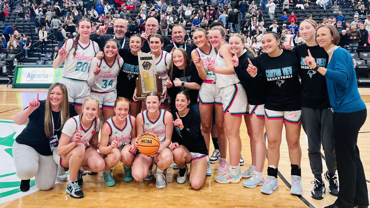 Canyon View girls basketball holding their 2nd State Title trophy in 19 years.