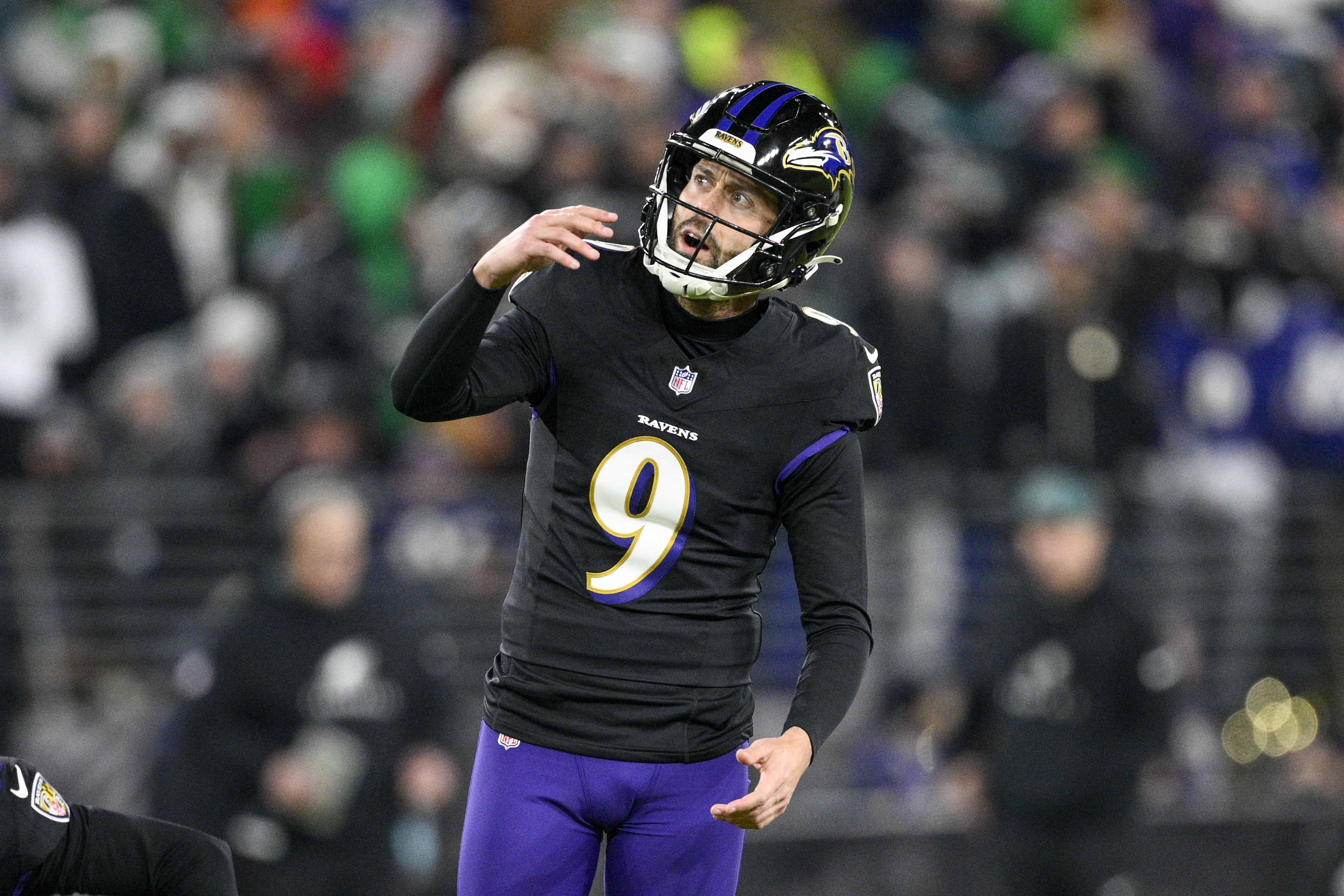 FILE - Baltimore Ravens kicker Justin Tucker watches his kick during the second half of an NFL football game against the Philadelphia Eagles, Dec. 1, 2024, in Baltimore. 