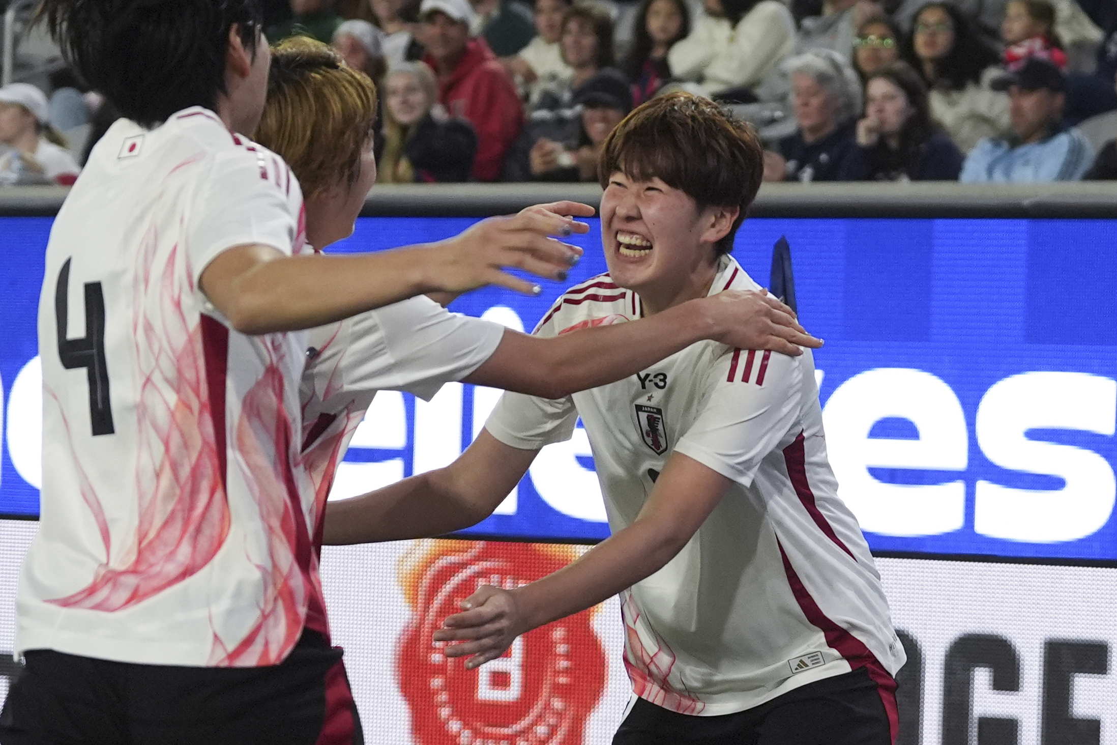 Japan defender Toko Koga, right, celebrates with teammates after scoring a goal against the United States during the second half of a SheBelieves Cup women's soccer tournament match Wednesday, Feb. 26, 2025, in San Diego. 