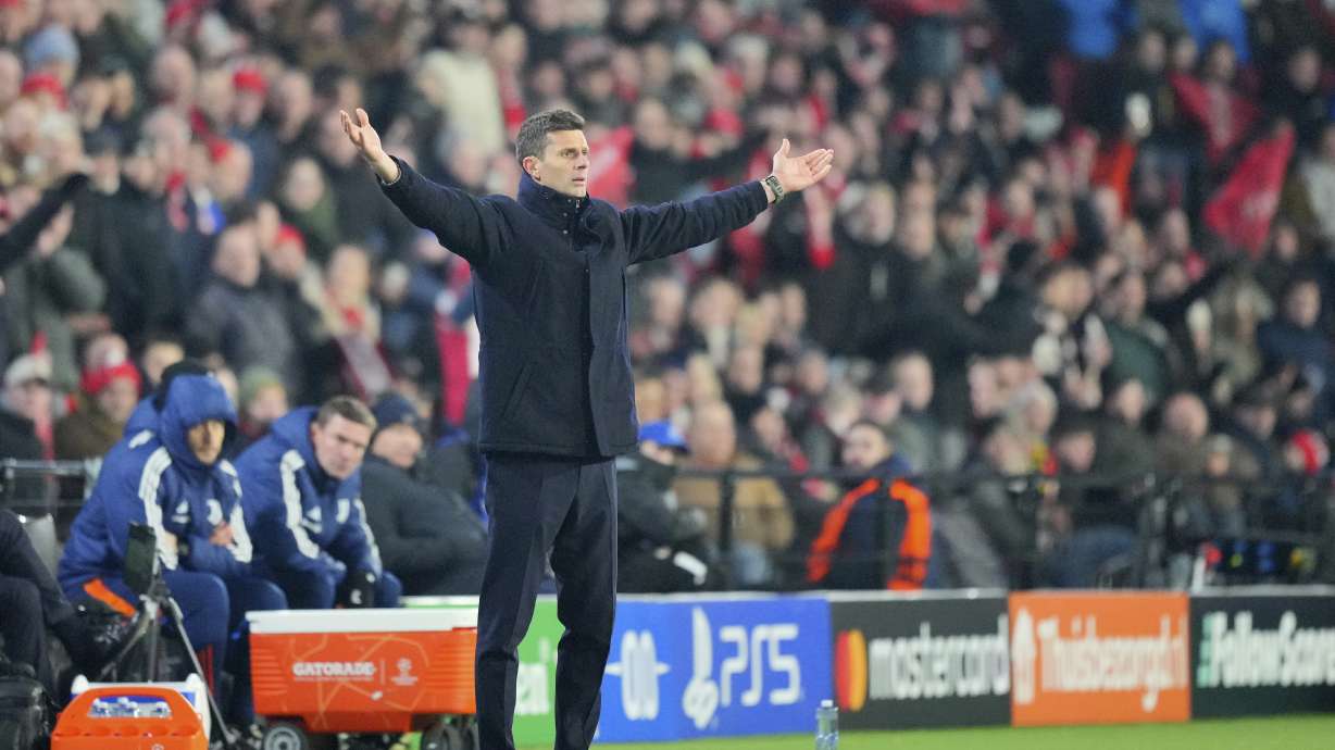 Juventus' head coach Thiago Motta reacts during the Champions League playoff second leg soccer match between PSV and Juventus at Phillips Stadium in Eindhoven, Netherlands, Wednesday, Feb.19, 2025.