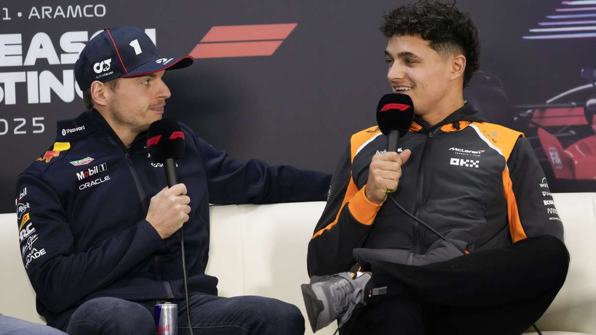 Red Bull driver Max Verstappen of the Netherlands, left, and McLaren driver Lando Norris of Britain talk at a press conference during a Formula One pre-season test at the Bahrain International Circuit in Sakhir, Bahrain, Thursday, Feb. 27, 2025.