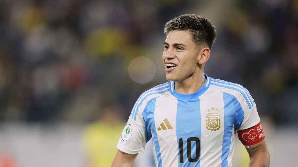 Argentina's Claudio Echeverri celebrates scoring his side's opening goal against Brazil, from the penalty spot, during a South American U-20 Championship final round soccer match in Caracas, Venezuela, Thursday, Feb. 13, 2025.