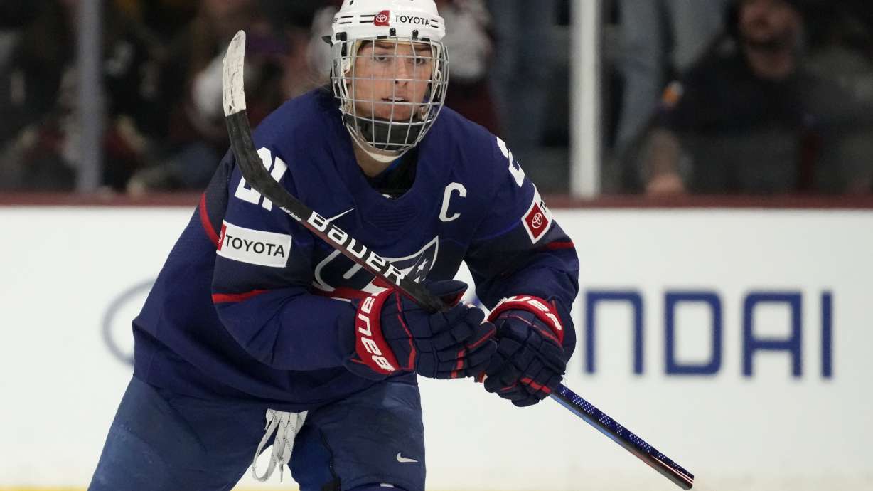 FILE - United States forward Hilary Knight skates to the bench to celebrate her goal against Canada during the first period of a rivalry series women's hockey game, Nov. 8, 2023, in Tempe, Ariz.