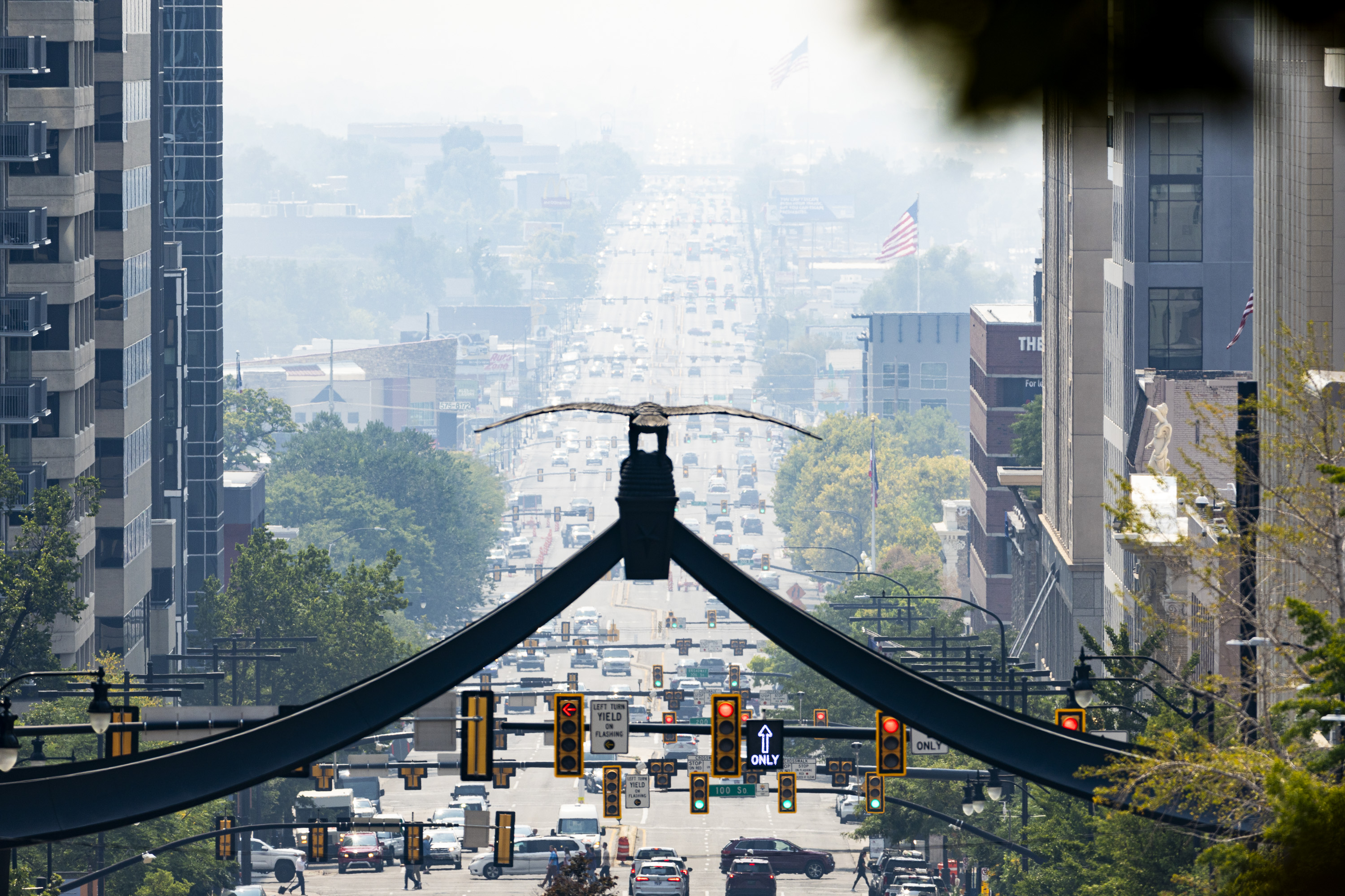 Traffic flows along State Street in downtown Salt Lake City Sept. 4, 2024. A transportation bill is still on track to study changes to Salt Lake City's busy roads, but without a part the city objected.