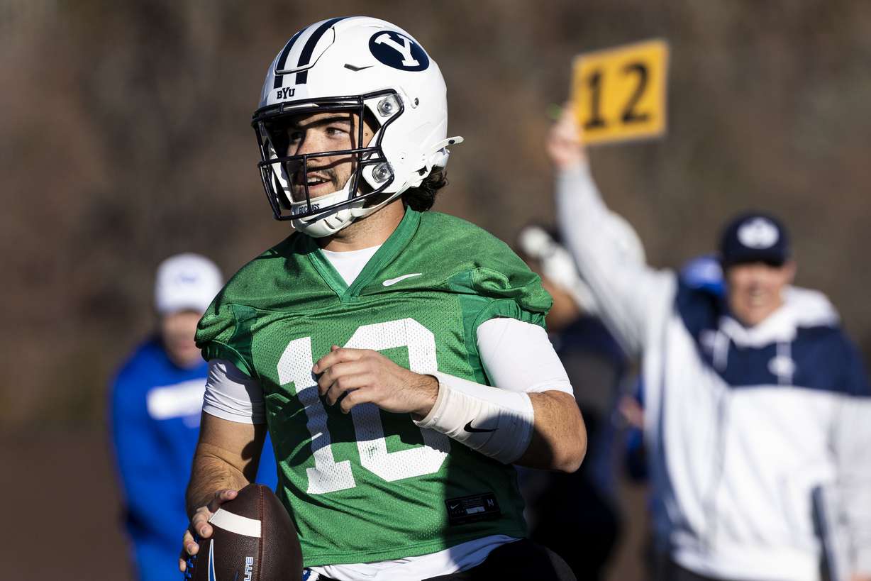 BYU quarterback Treyson Bourguet (10) runs the ball during the opening day of BYU football spring camp held at the Zions Bank Practice Fields of the Student Athlete Building on the campus of Brigham Young University in Provo on Thursday, Feb. 27, 2025.