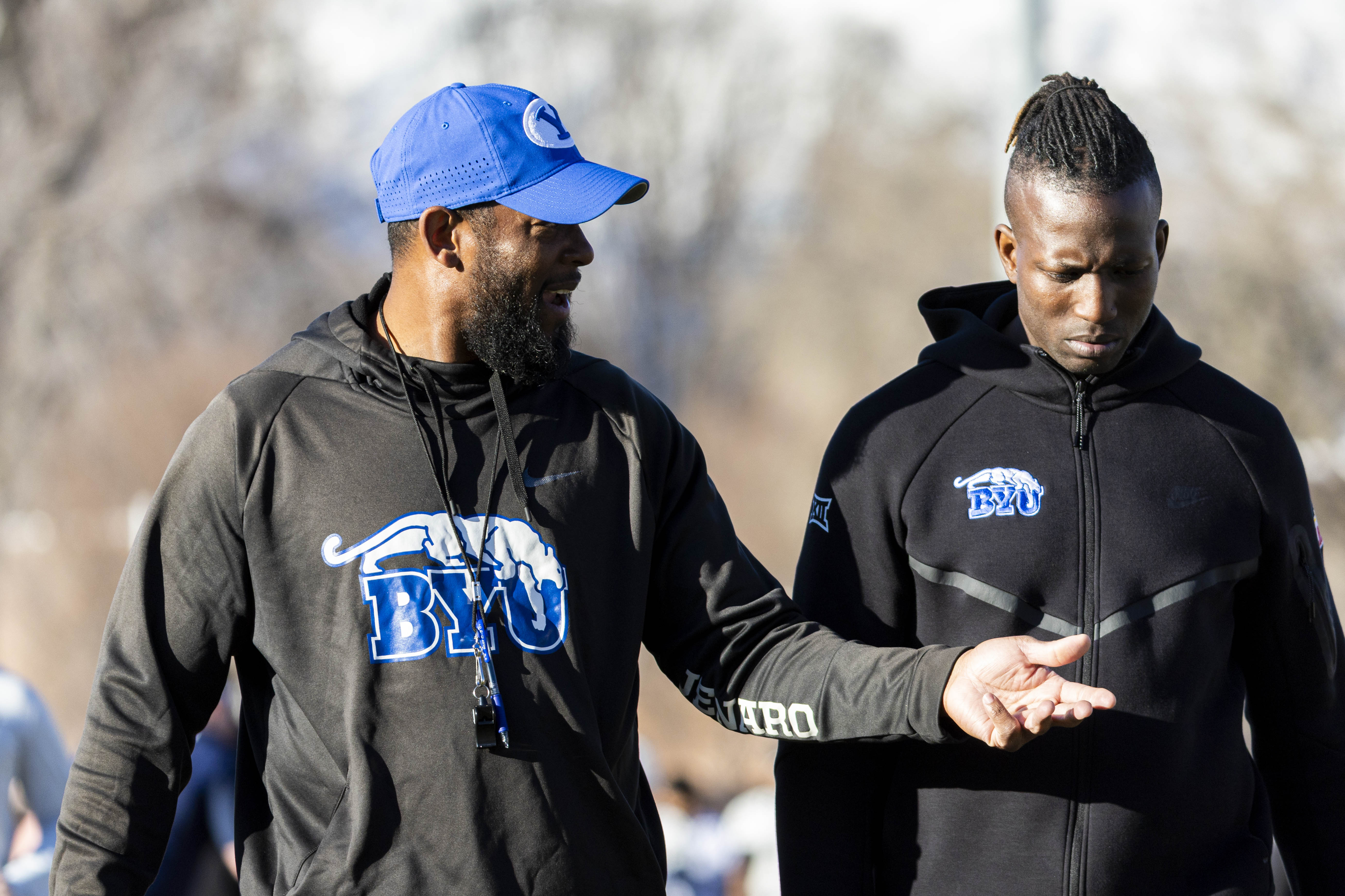 BYU cornerbacks coach Jernaro Gilford talks as he walks off the field after the opening day of BYU football spring camp held at the Zions Bank Practice Fields of the Student Athlete Building on the campus of Brigham Young University in Provo on Thursday, Feb. 27, 2025.