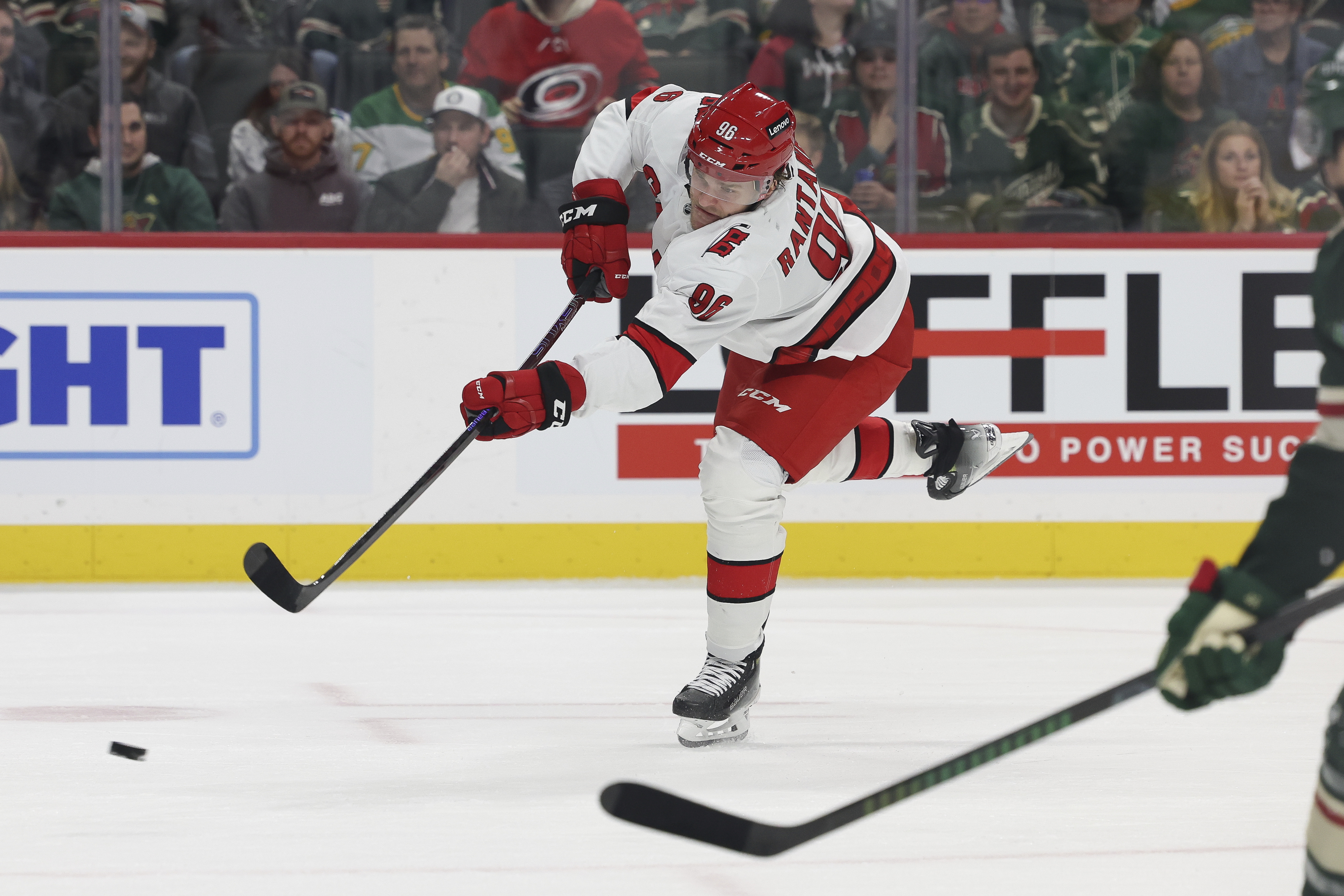 Carolina Hurricanes right wing Mikko Rantanen (96) shoots the puck against the Minnesota Wild during the second period of an NHL hockey game Thursday, Feb. 6, 2025, in St. Paul, Minn. 