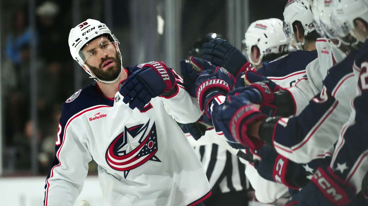 FILE - Columbus Blue Jackets center Boone Jenner celebrates his goal scored against the Arizona Coyotes during the first period of an NHL hockey game Tuesday, March 26, 2024, in Tempe, Ariz.
