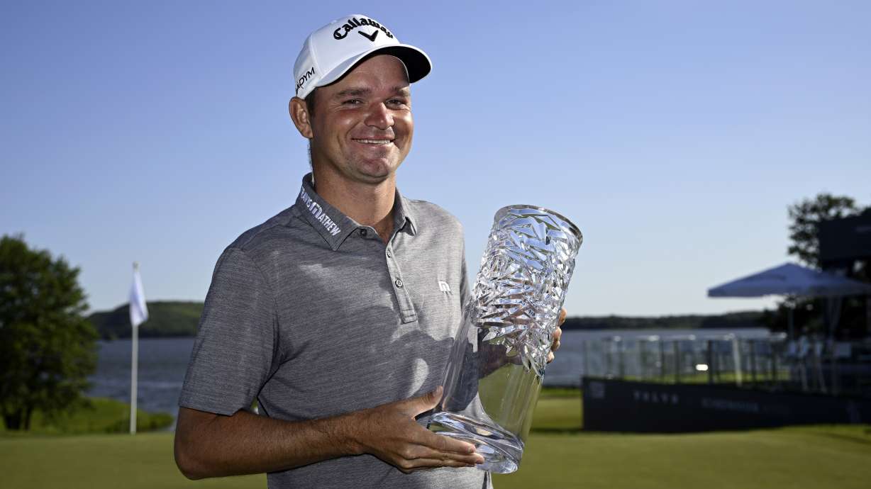 FILE - Britain's Dale Whitnell holds the trophy after winning the PGA European Tour, Scandinavian Mixed, at Ullna golf course outside Stockholm, Sweden, Sunday June 11, 2023, file.