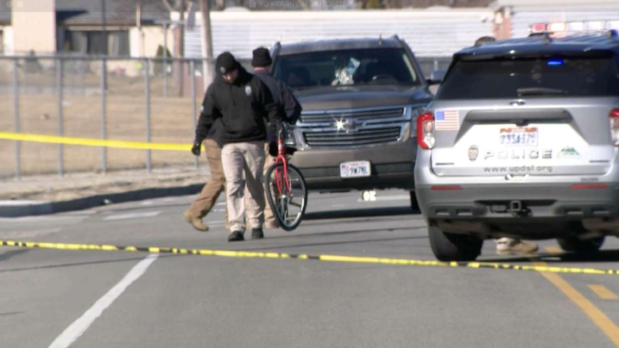 West Jordan police investigate after a 12-year-old boy was hit and killed while attempting to cross Sam's Boulevard on a bicycle at 4140 West near Kearns Junior High School on Thursday.