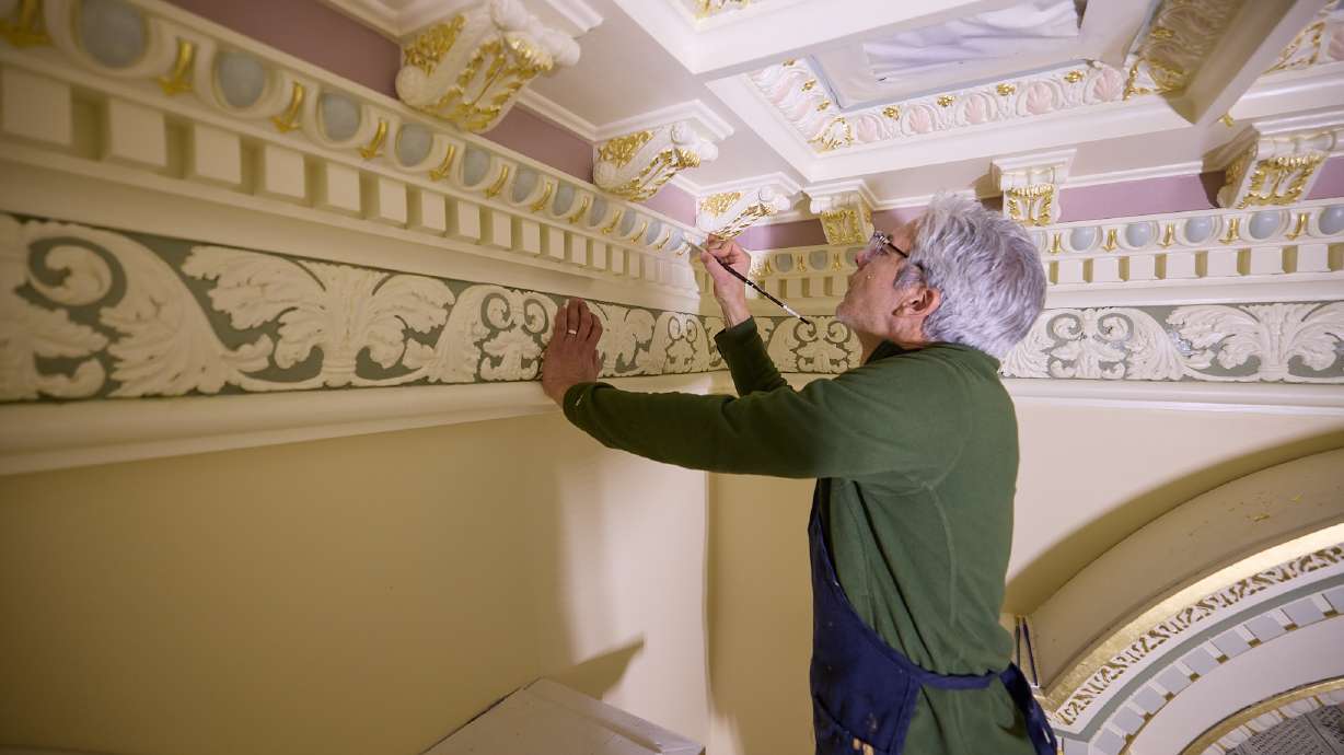 Delicate finish work underway in one of the sealing rooms in the north addition of the Salt Lake Temple on Feb. 12. Downtown leaders believe the Salt Lake Temple's six-month open house in 2027, could have a big economic impact for the local economy.