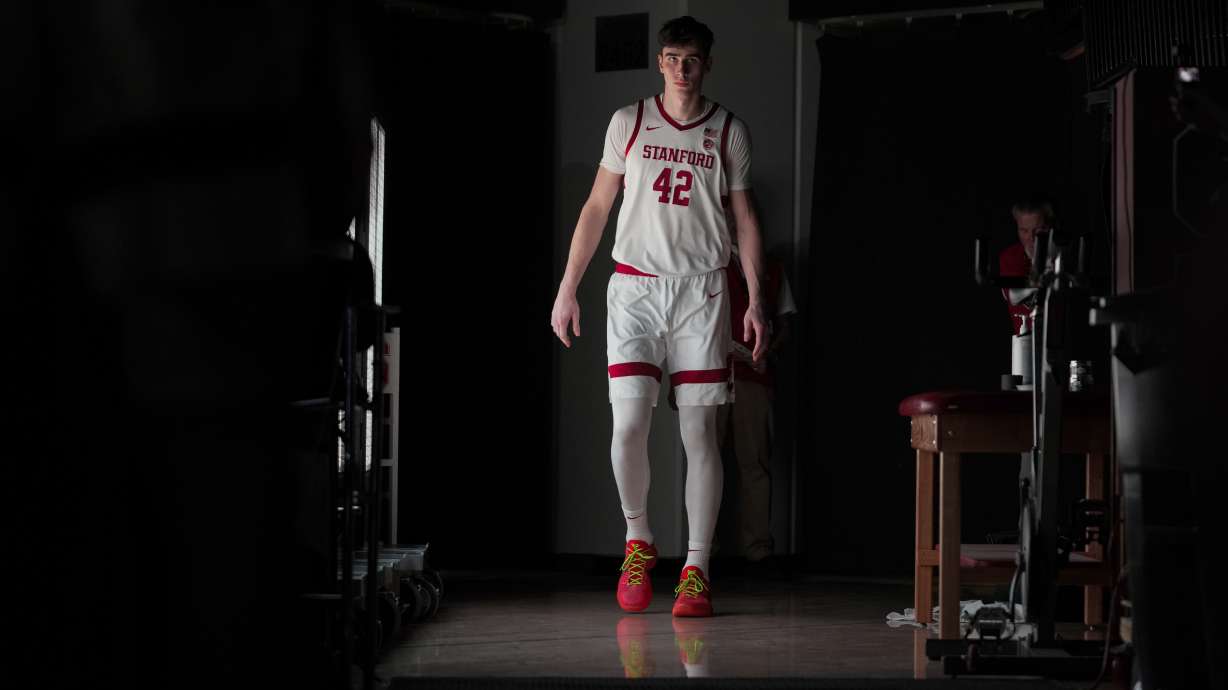 Stanford forward Maxime Raynaud (42) is introduced for the start of an NCAA college basketball game against California, Saturday, Feb. 22, 2025, in Stanford, Calif.