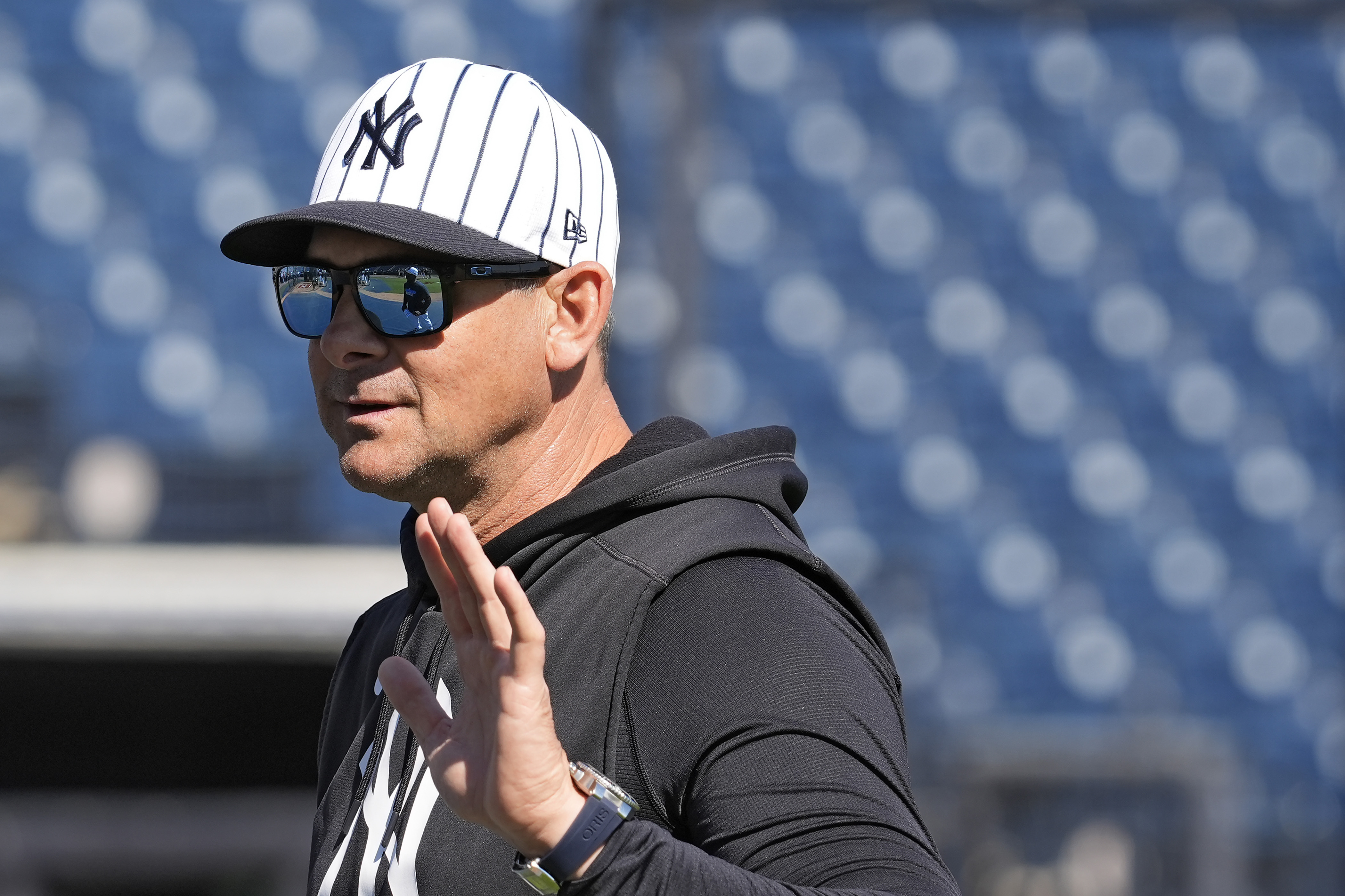 New York Yankees manager Aaron Boone gestures as he talks to players before a spring training baseball game against the St. Louis Cardinals Wednesday, Feb. 26, 2025, in Tampa, Fla. 