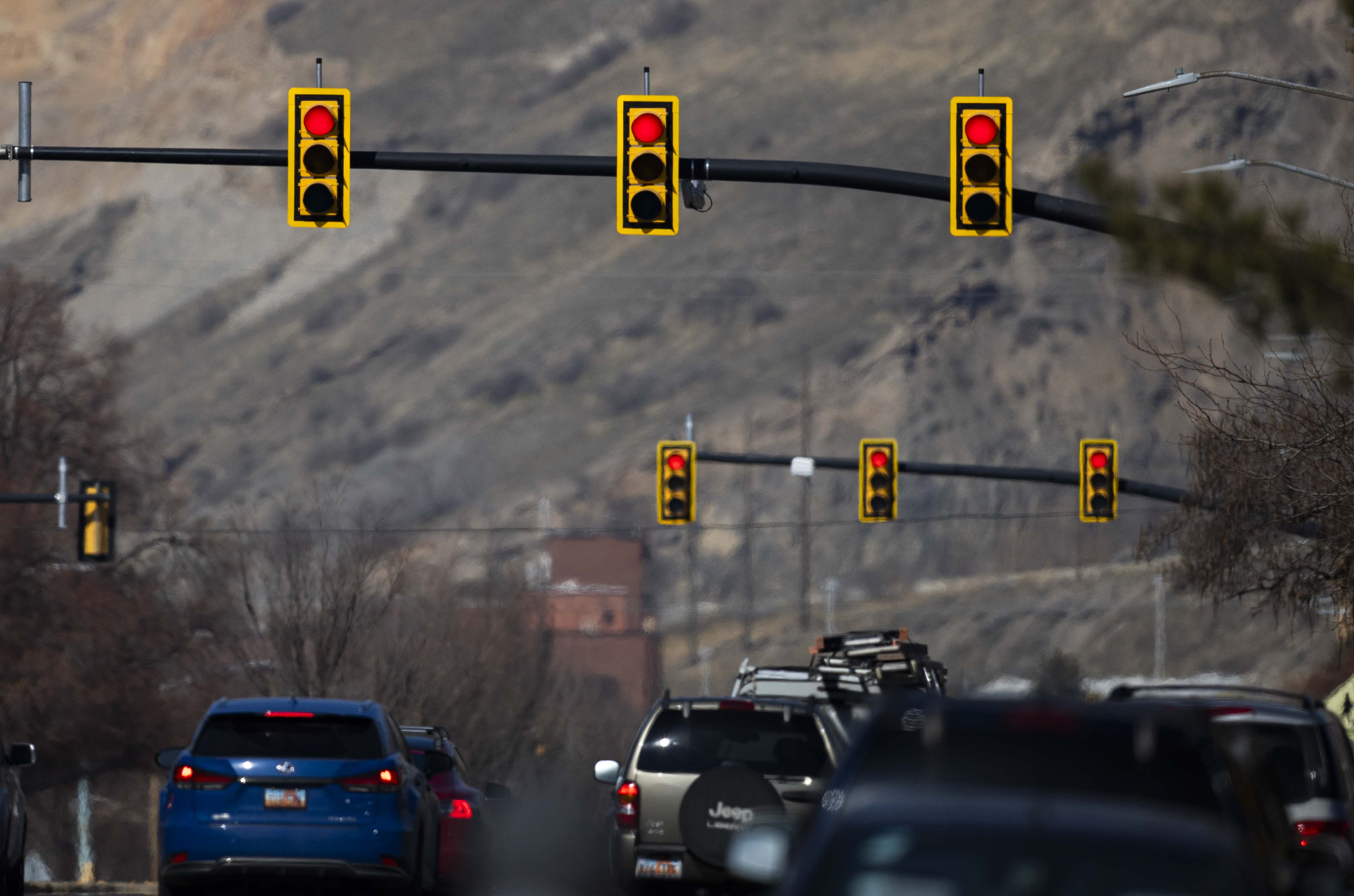 Red lights show on traffic signals in Salt Lake City on Feb. 28, 2025. How traffic signals work can vary depending on certain factors, including programming and traffic itself.