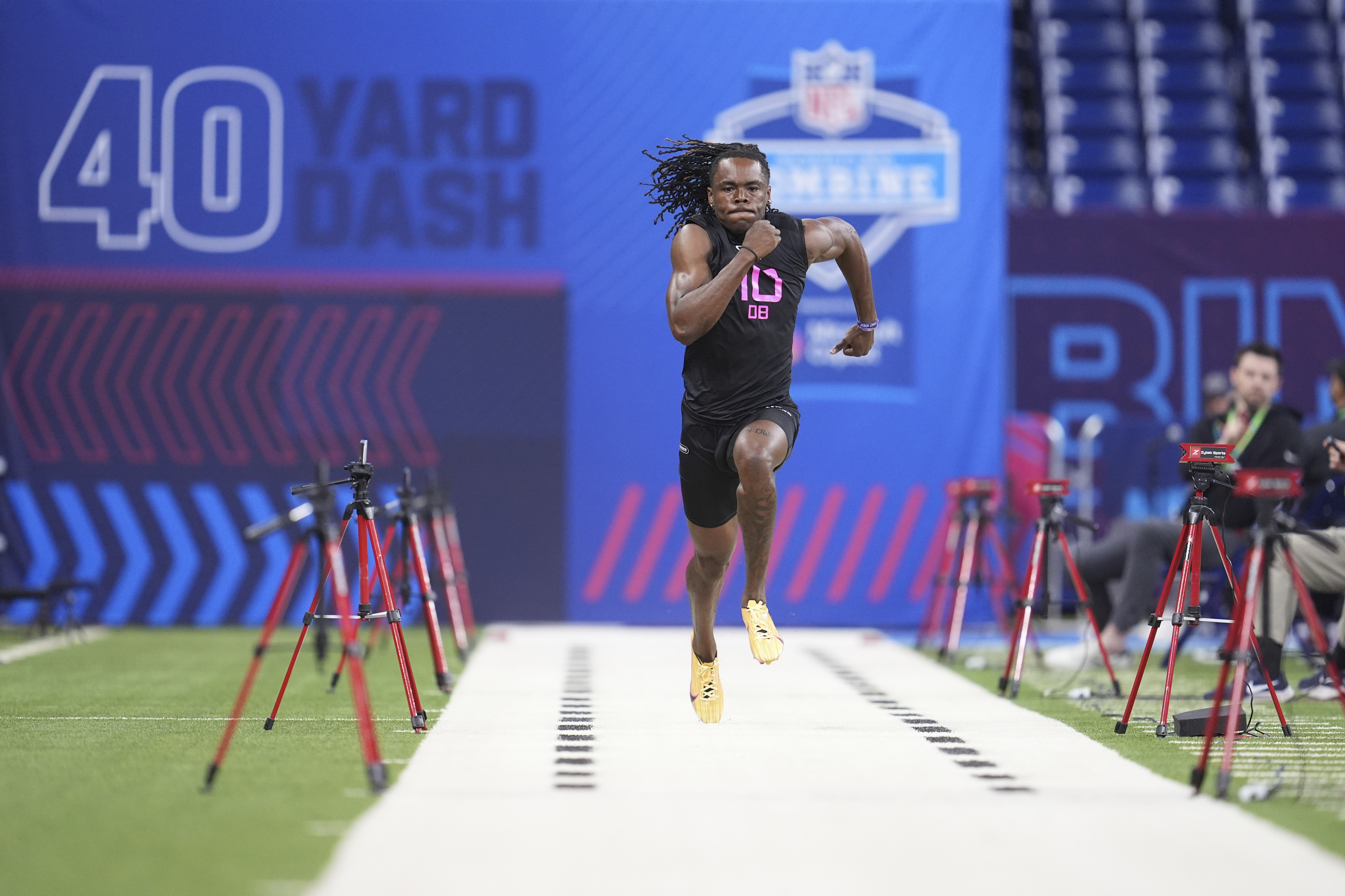 Kentucky defensive back Max Hairston runs the 40-yard dash at the NFL football scouting combine in Indianapolis, Friday, Jan. 28, 2025. 