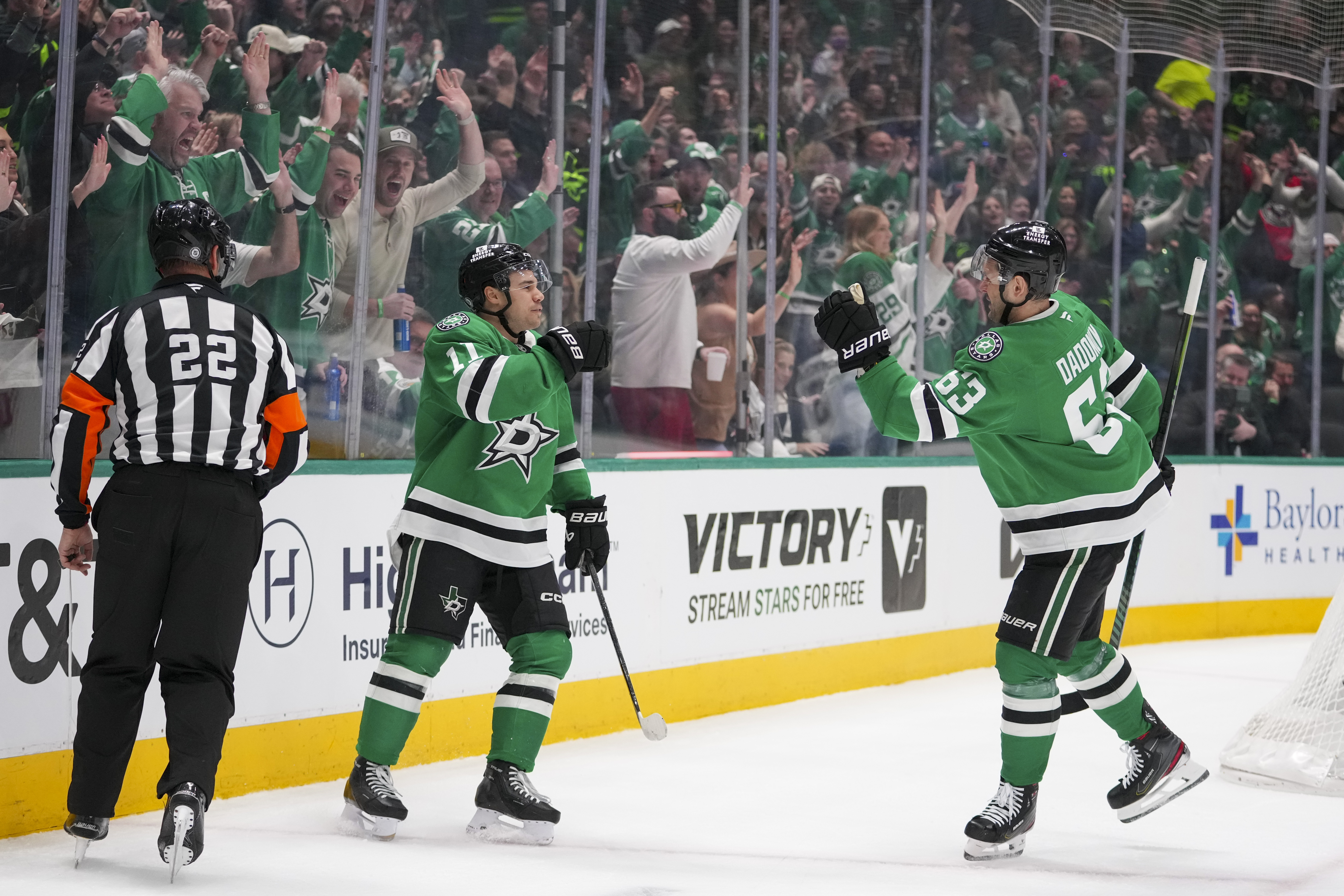 Dallas Stars center Logan Stankoven (11) celebrates his first period goal with right wing Evgenii Dadonov (63) during an NHL hockey game against the Los Angeles Kings Friday, Feb. 28, 2025, in Dallas.
