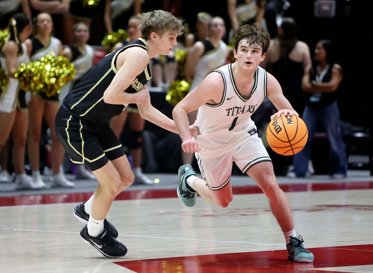 Olympus guard Gavin Lowe drives to the basket against Highland during the 5A state boys basketball championship game at the Huntsman Center in Salt Lake City on Friday, Feb. 28, 2025. Olympus won 69-40.