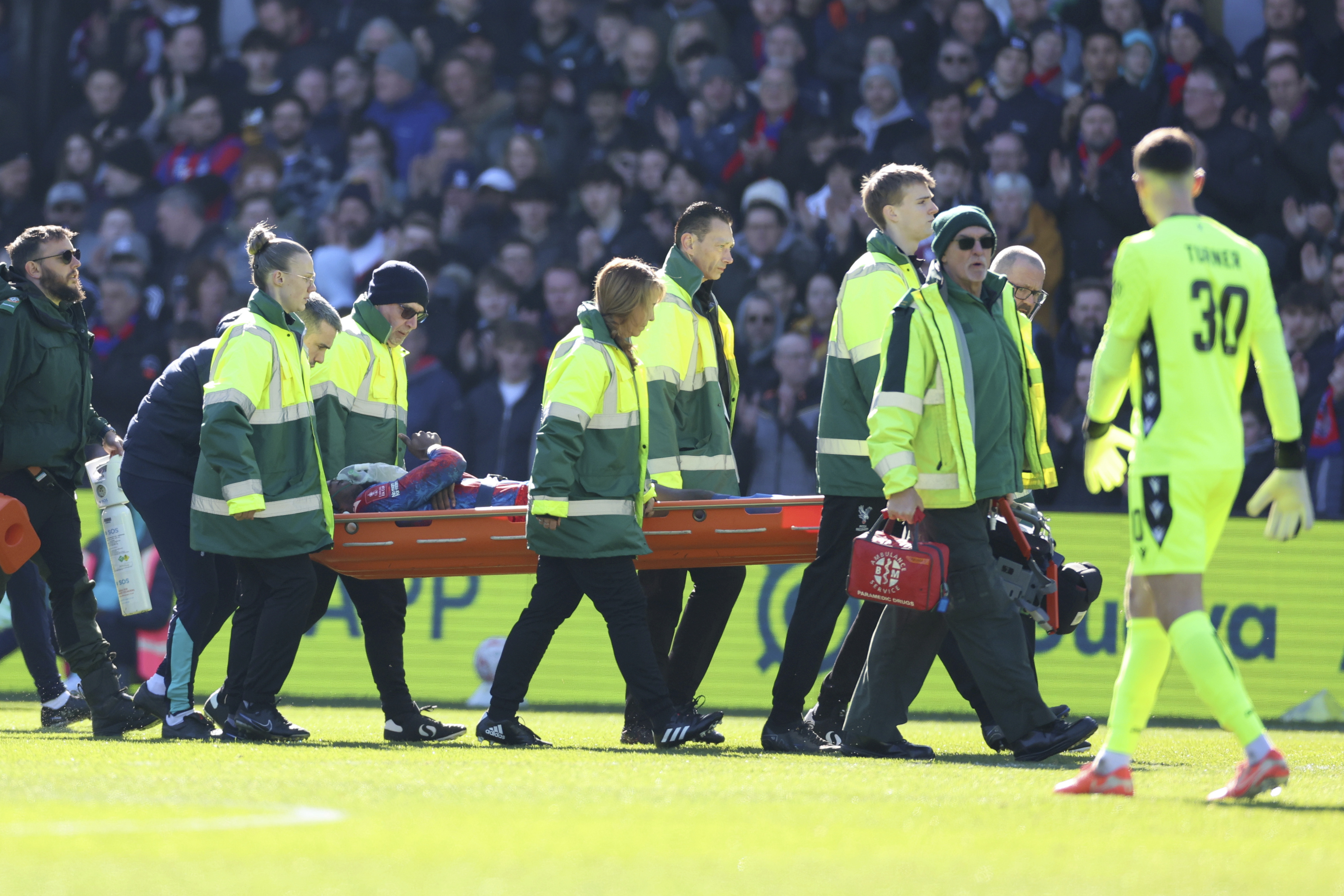 Crystal Palace's Jean-Philippe Mateta is substituted off on a stretcher during the English FA Cup soccer match between Crystal Palace and Millwall at Selhurst Park, London, England, Saturday, March 1, 2025. 