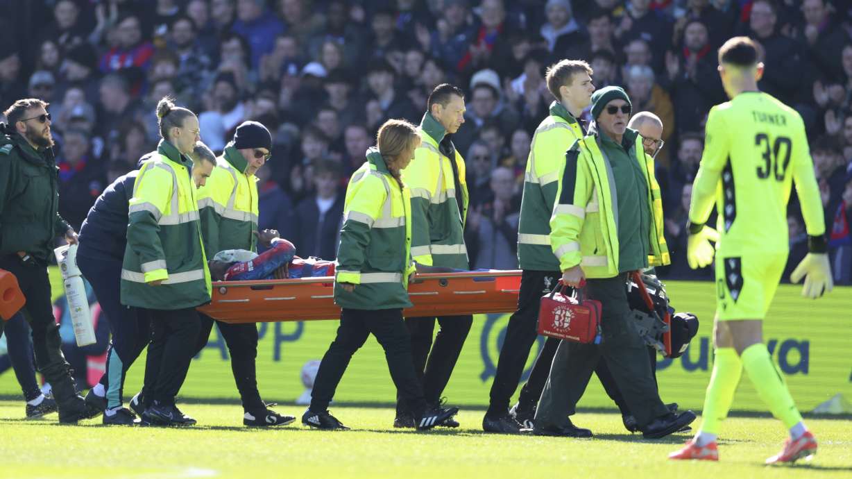 Crystal Palace's Jean-Philippe Mateta is substituted off on a stretcher during the English FA Cup soccer match between Crystal Palace and Millwall at Selhurst Park, London, England, Saturday, March 1, 2025.