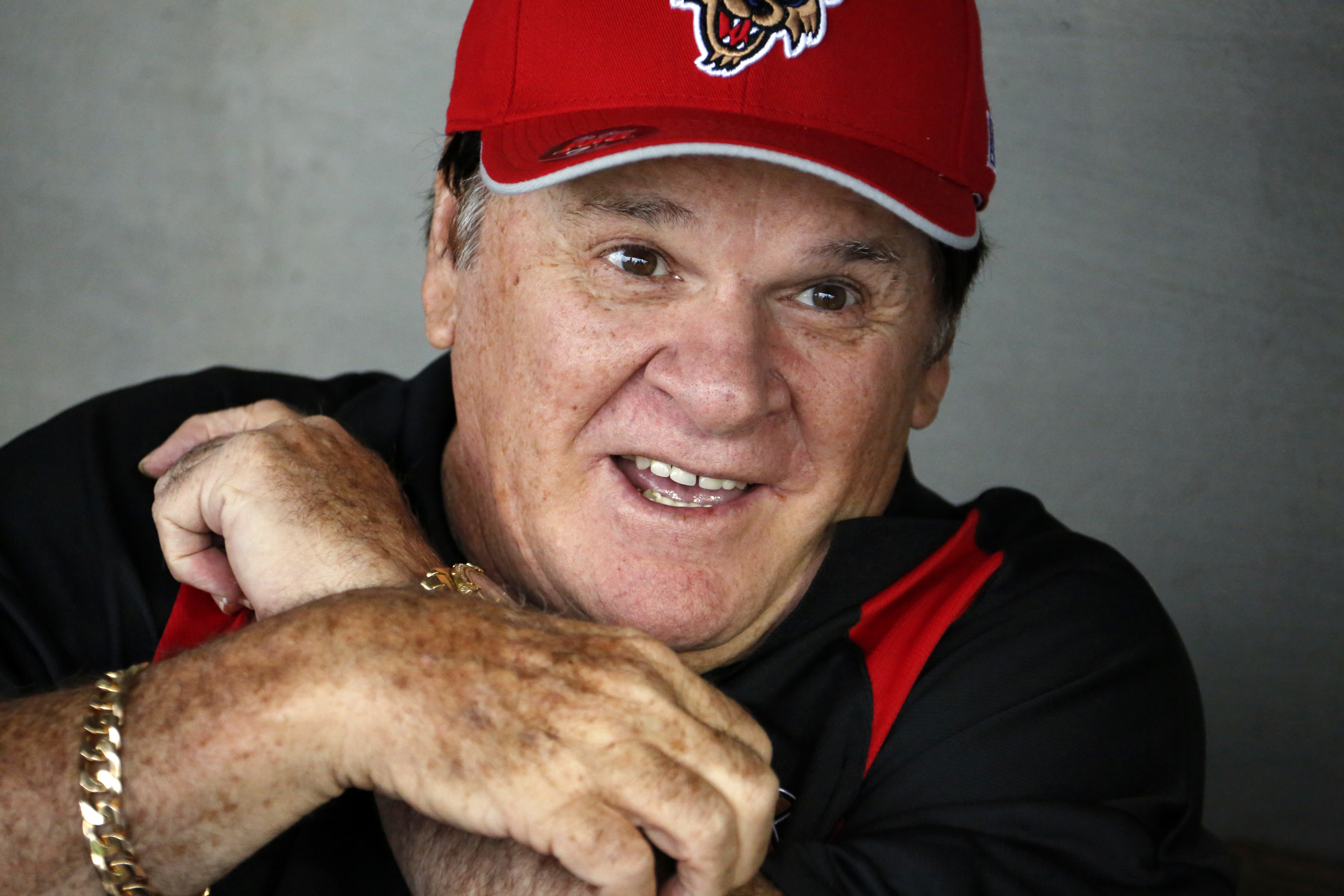 FILE - Pete Rose sits in the Washington Wild Things dugout before a Frontier League baseball game against the Lake Erie Crushers in Washington, Pa, Tuesday, June 30, 2015. 