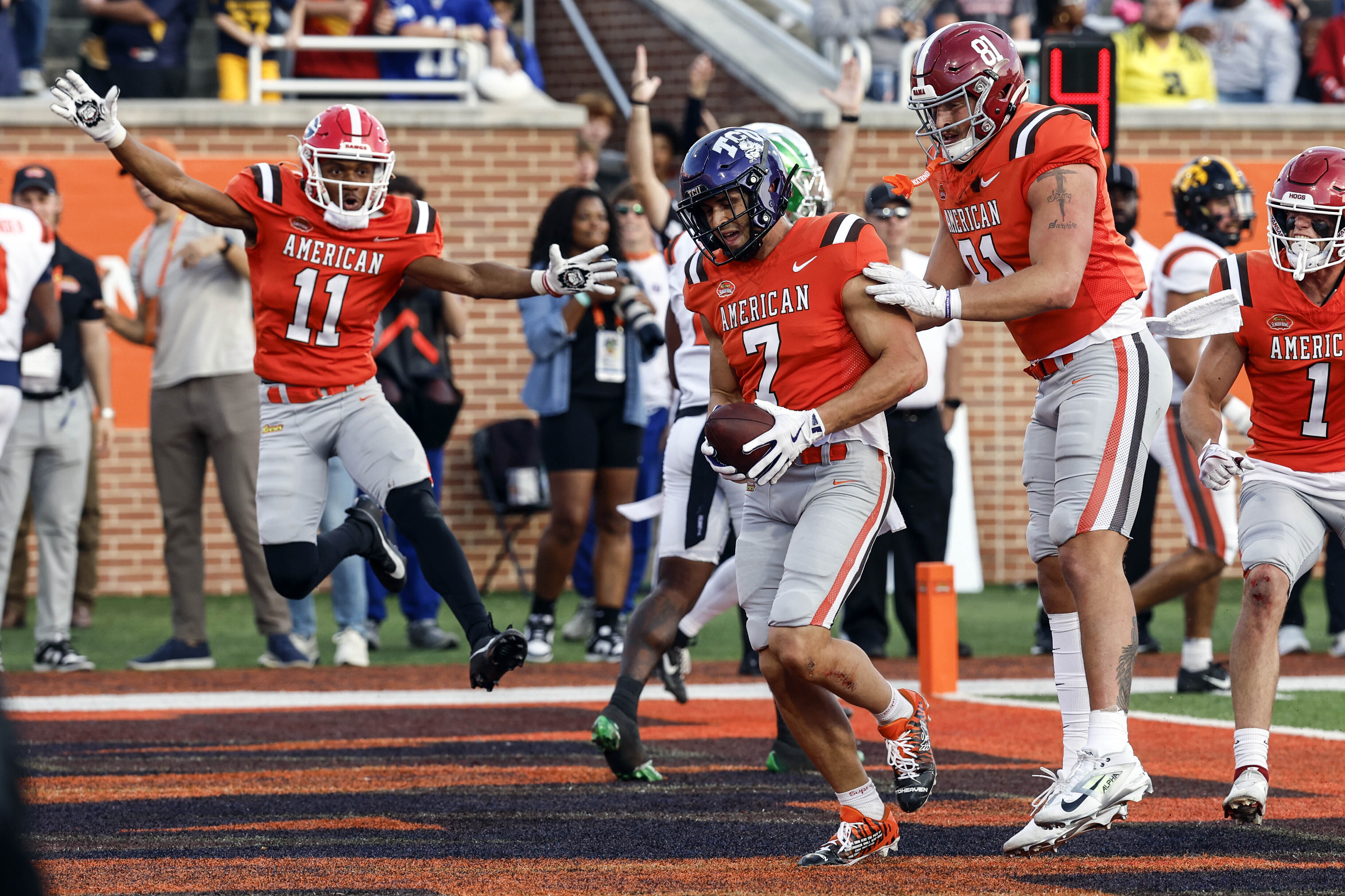 American team wide receiver Jack Bech (7), of TCU, celebrates with teammates after scoring the winning touchdown over the National team during the second half of the Senior Bowl NCAA college football game, Saturday, Feb. 1, 2025, in Mobile, Ala.